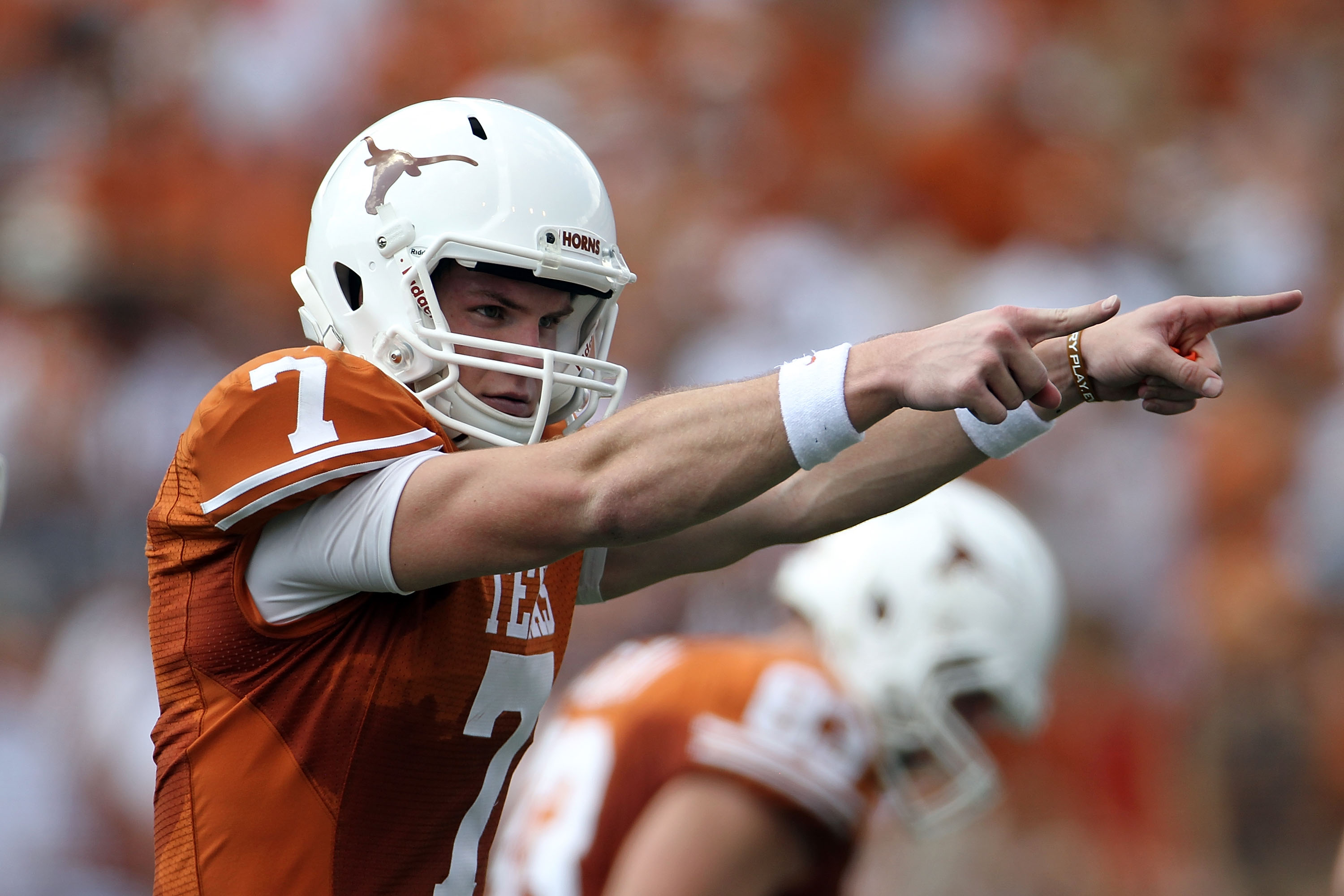 AUSTIN, TX - SEPTEMBER 25: Quarterback Garrett Gilbert #7 of the Texas Longhorns during the first quarter against the UCLA Bruins at Darrell K Royal-Texas Memorial Stadium on September 25, 2010 in Austin, Texas. (Photo by Ronald Martinez/Getty Images) AUSTIN, TX - SEPTEMBER 25: Quarterback Garrett Gilbert #7 of the Texas Longhorns during the first quarter against the UCLA Bruins at Darrell K Royal-Texas Memorial Stadium on September 25, 2010 in Austin, Texas. (Photo by Ronald Martinez/Getty Images)