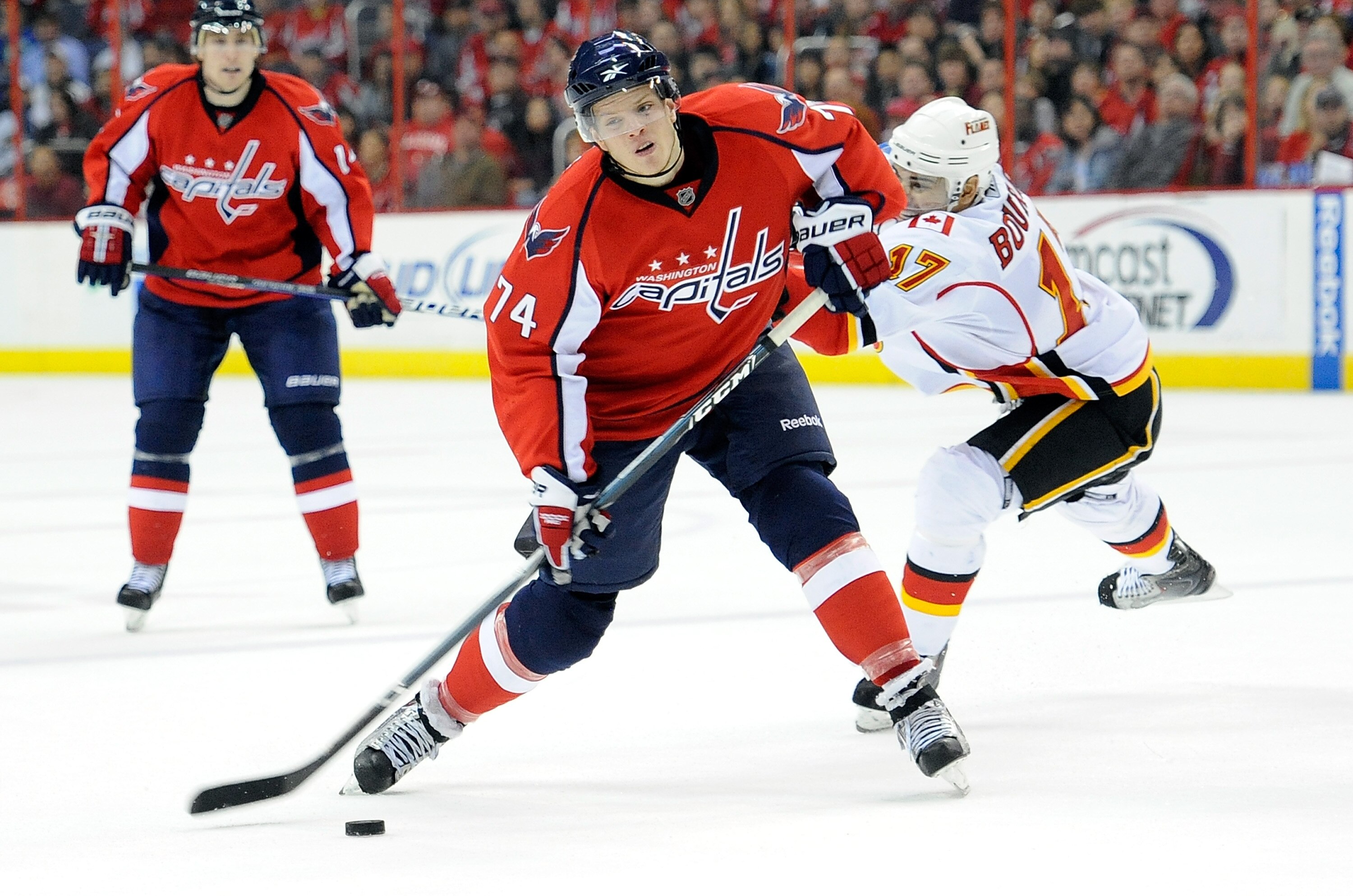 WASHINGTON - MARCH 28:  John Carlson #74 of the Washington Capitals shoots the puck against the Calgary Flames at the Verizon Center on March 28, 2010 in Washington, DC.  (Photo by Greg Fiume/Getty Images)