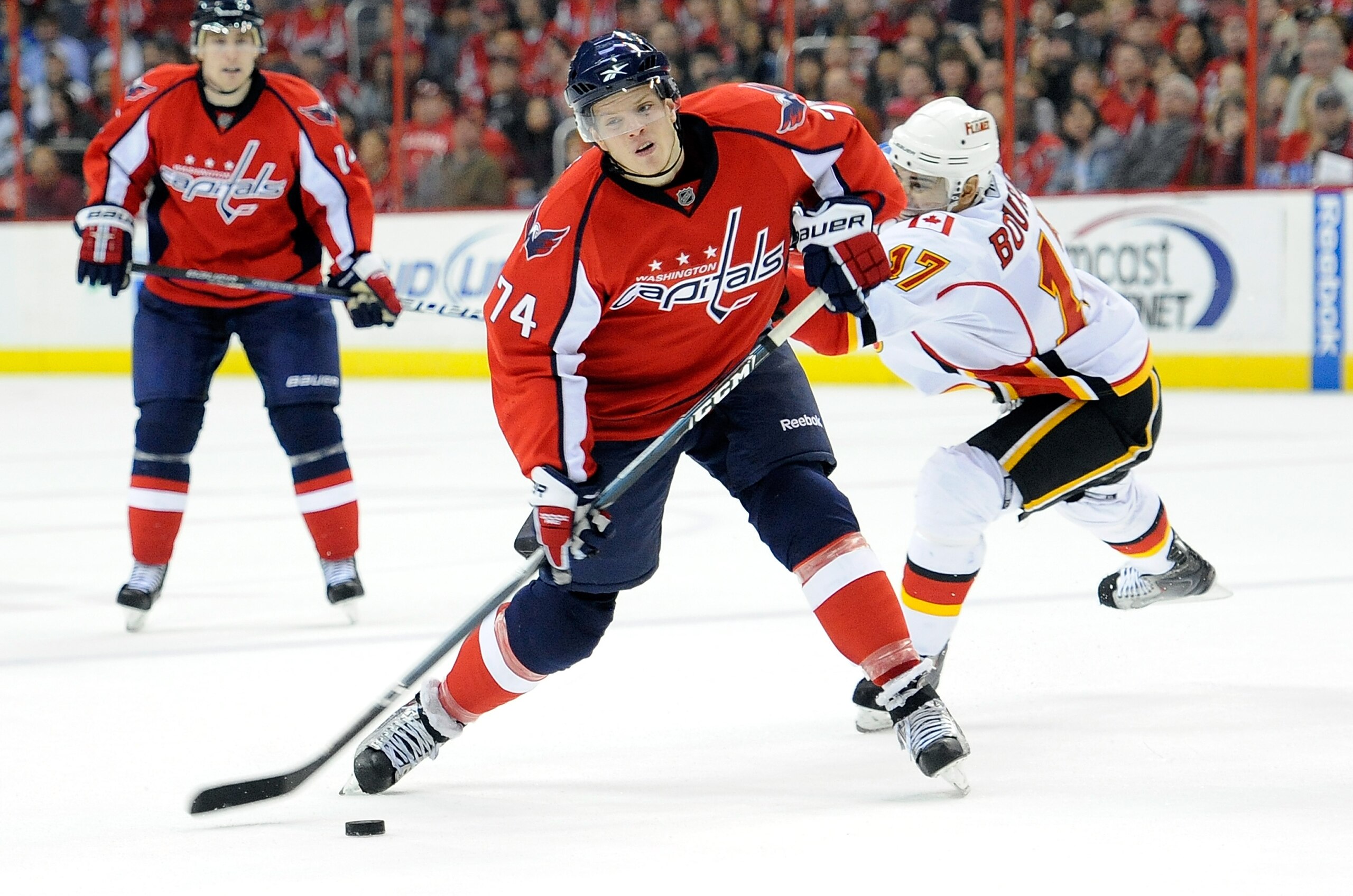WASHINGTON - MARCH 28:  John Carlson #74 of the Washington Capitals shoots the puck against the Calgary Flames at the Verizon Center on March 28, 2010 in Washington, DC.  (Photo by Greg Fiume/Getty Images)