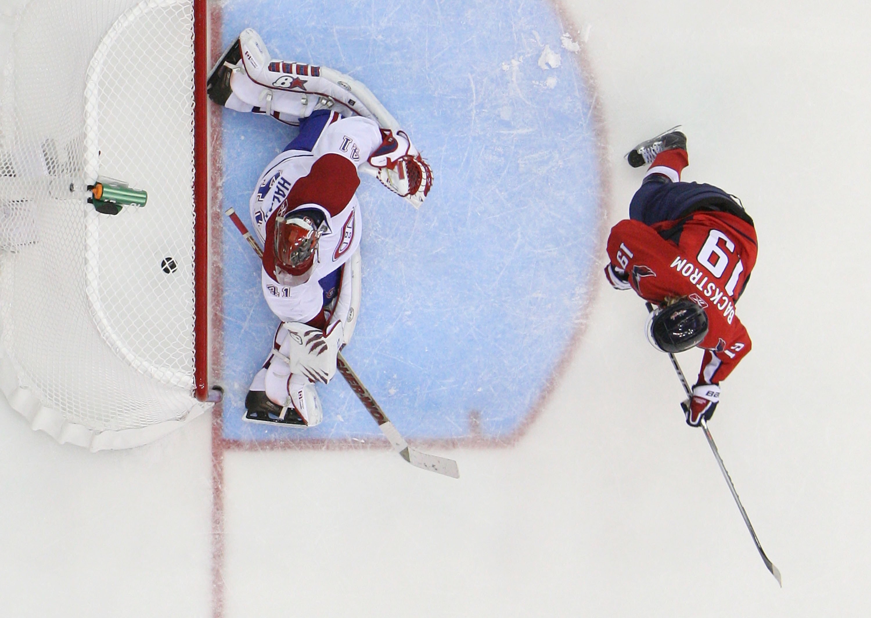 WASHINGTON - APRIL 17: Nicklas Backstrom #19 of the Washington Capitals scores on Jaroslav Halak #41 of the Montreal Canadiens in Game Two of the Eastern Conference Quarterfinals during the 2010 NHL Stanley Cup Playoffs at the Verizon Center on April 17, 