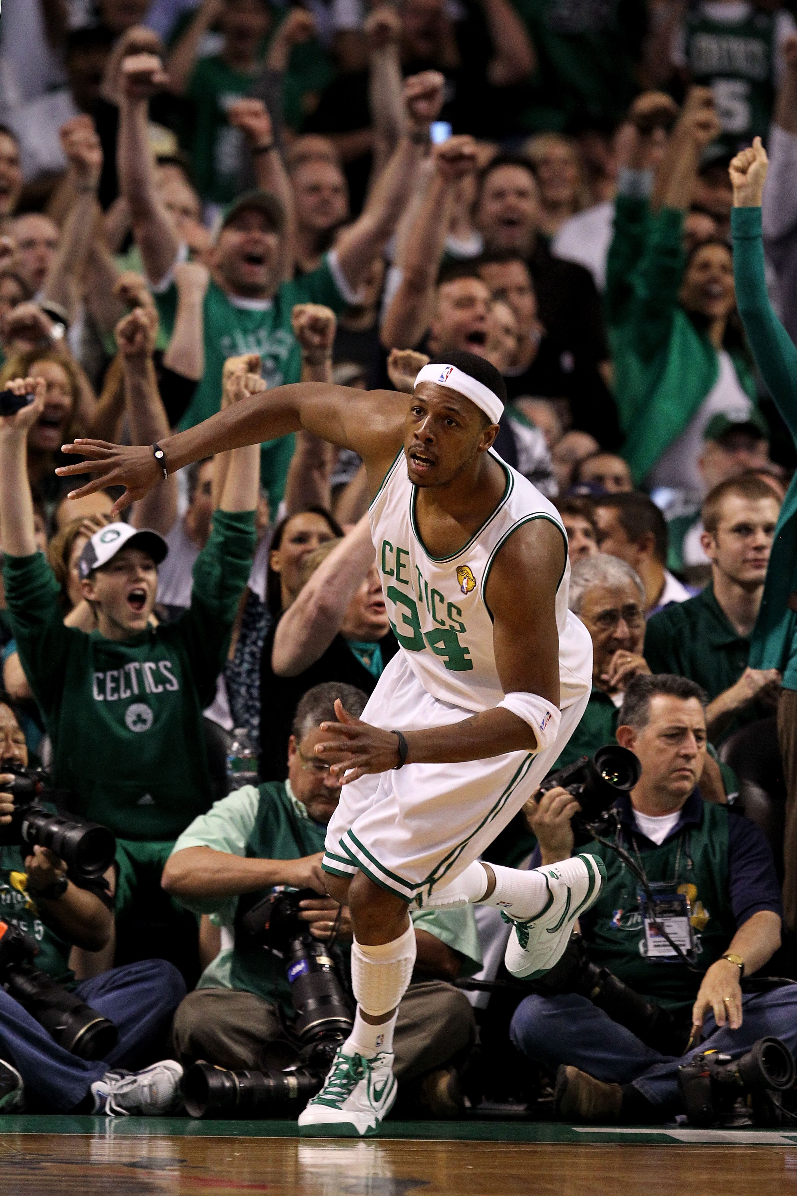 BOSTON - JUNE 13:  Fans cheer as Paul Pierce #34 of the Boston Celtics reacts after he made a basket in the first quarter against the Los Angeles Lakers during Game Five of the 2010 NBA Finals on June 13, 2010 at TD Garden in Boston, Massachusetts. NOTE T