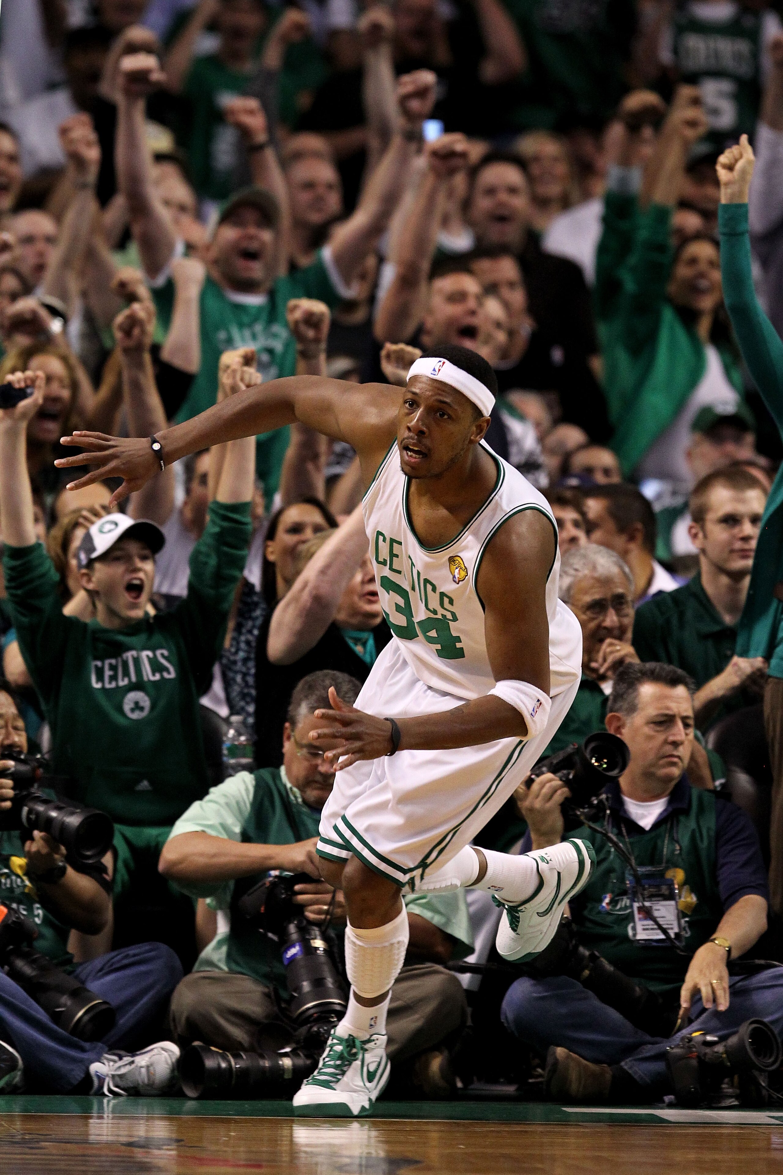 BOSTON - JUNE 13:  Fans cheer as Paul Pierce #34 of the Boston Celtics reacts after he made a basket in the first quarter against the Los Angeles Lakers during Game Five of the 2010 NBA Finals on June 13, 2010 at TD Garden in Boston, Massachusetts. NOTE T