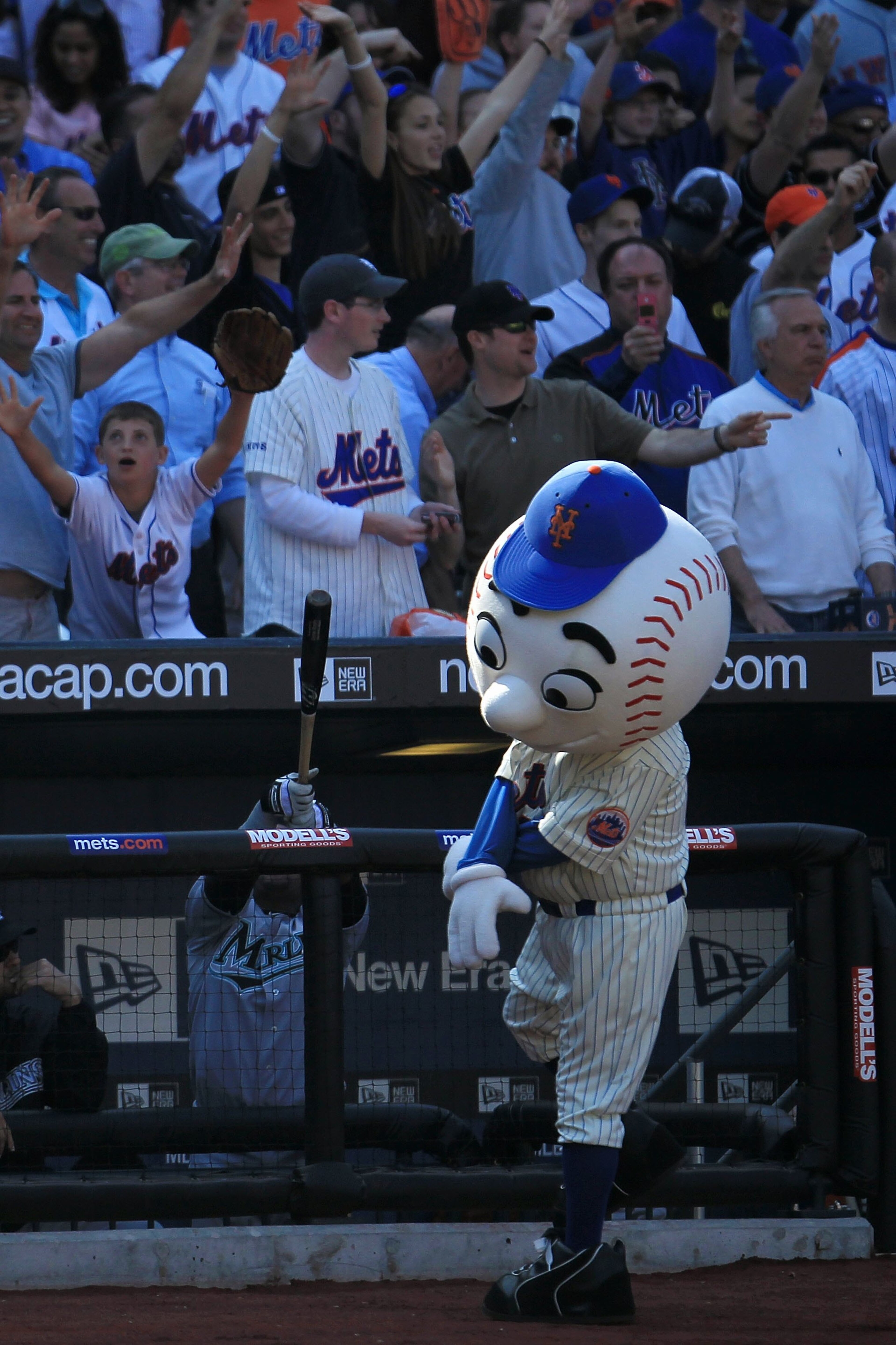 NEW YORK - APRIL 05: Mr. Met interacts with the crowd in the game between the Florida Marlins and the New York Mets during their Opening Day game at Citi Field on April 5, 2010 in the Flushing neighbourhood of the Queens borough of New York City. (Photo NEW YORK - APRIL 05: Mr. Met interacts with the crowd in the game between the Florida Marlins and the New York Mets during their Opening Day game at Citi Field on April 5, 2010 in the Flushing neighbourhood of the Queens borough of New York City. (Photo