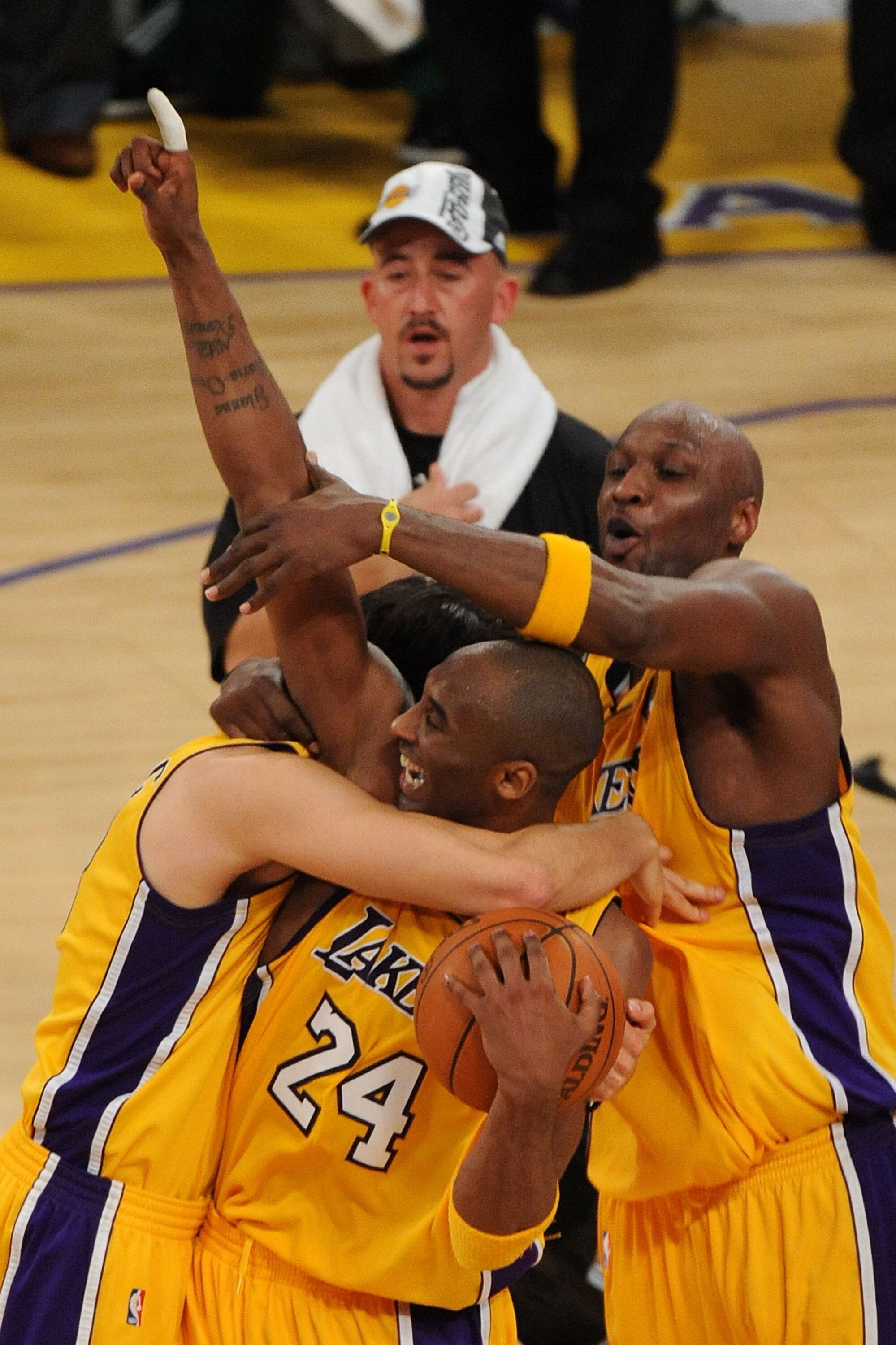 LOS ANGELES, CA - JUNE 17:  Kobe Bryant #24, Lamar Odom #7 and Sasha Vujacic #18 of the Los Angeles Lakers celebrate after winning the 2010 NBA Championship 83-79 against the Boston Celtics in Game Seven of the 2010 NBA Finals at Staples Center on June 17