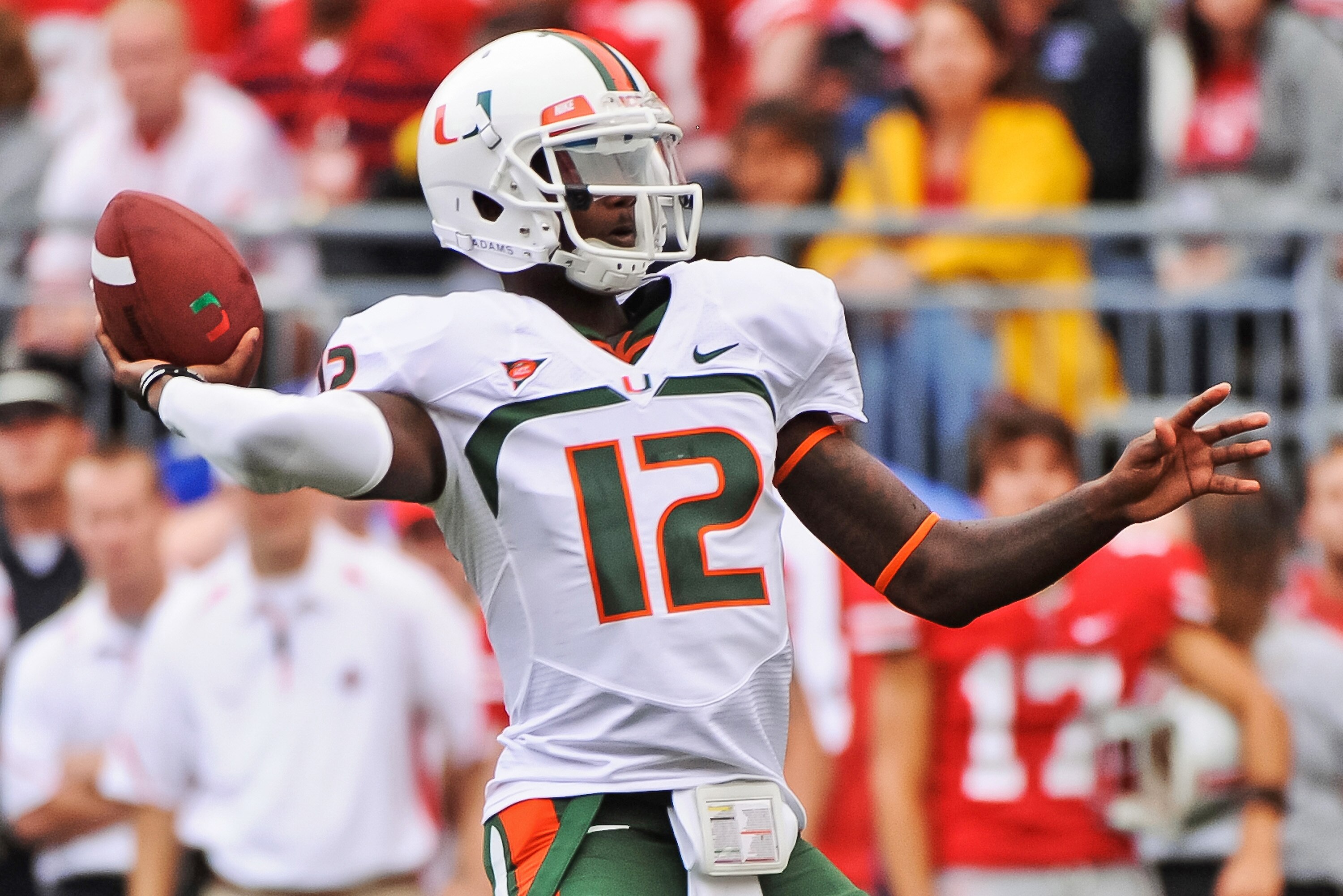 COLUMBUS, OH - SEPTEMBER 11:  Quarterback Jacory Harris #12 of the Miami Hurricanes passes the ball against the Ohio State Buckeyes at Ohio Stadium on September 11, 2010 in Columbus, Ohio.  (Photo by Jamie Sabau/Getty Images)