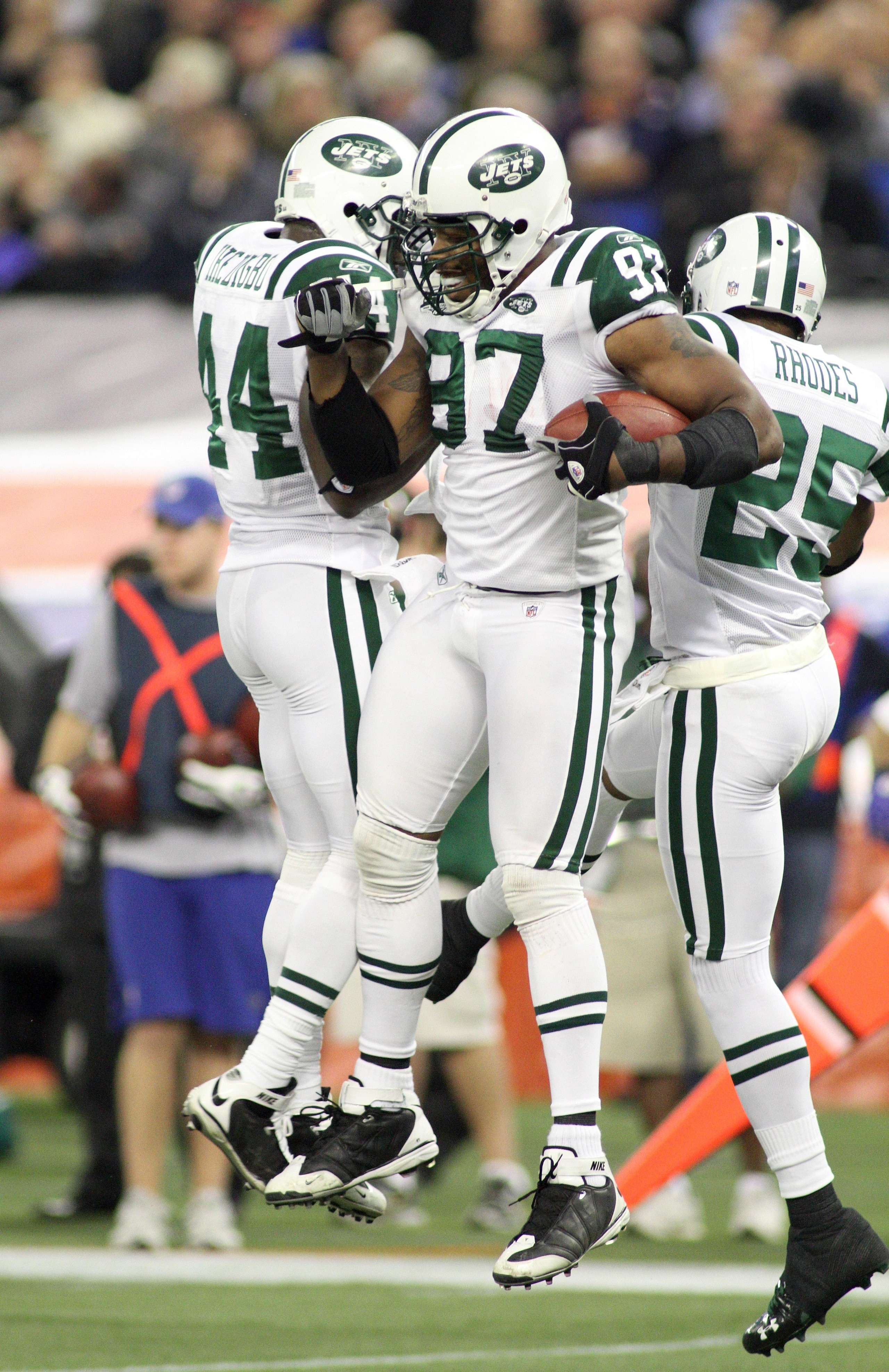 TORONTO - DECEMBER 3:  (L-R) James Ihedigbo #44, Calvin Pace #97 and Kerry Rhodes #25 of the New York Jets celebrate after a defensive play during their NFL game against the Buffalo Bills on December 3, 2009  at Rogers Centre in Toronto, Ontario, Canada.