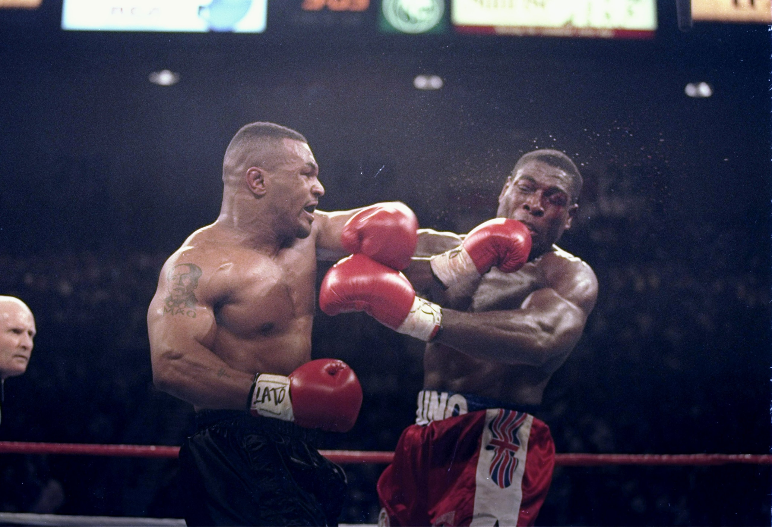 16 Mar 1996:  Mike Tyson lands a left on Frank Bruno of Great Britain in the second round of the WBC Heavyweight Championship bout at the MGM Grand Garden in Las Vegas, Nevada.  Tyson won the title with a technical knockout in the third round. Mandatory C