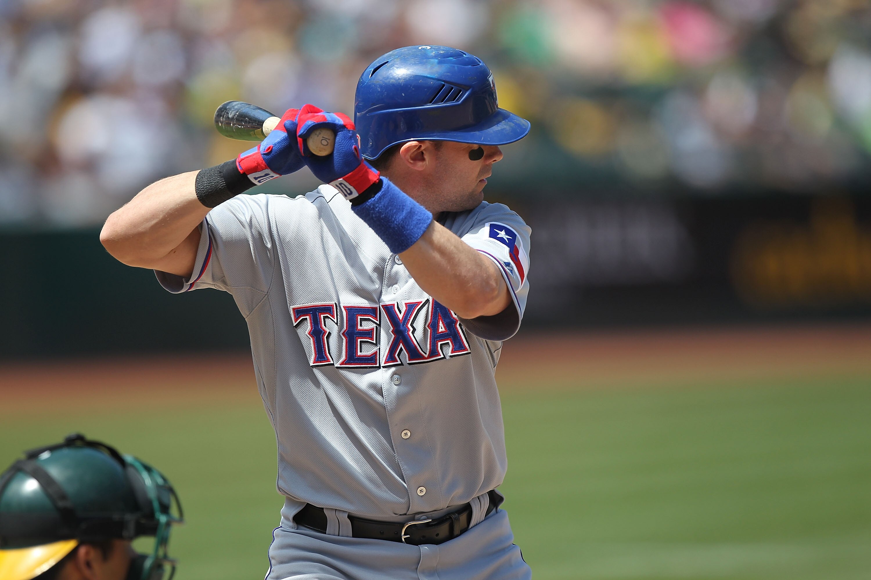 OAKLAND, CA - AUGUST 08:  Michael Young #10 of the Texas Rangers in action against the Oakland Athletics during an MLB game at the Oakland-Alameda County Coliseum on August 8, 2010 in Oakland, California.  (Photo by Jed Jacobsohn/Getty Images)