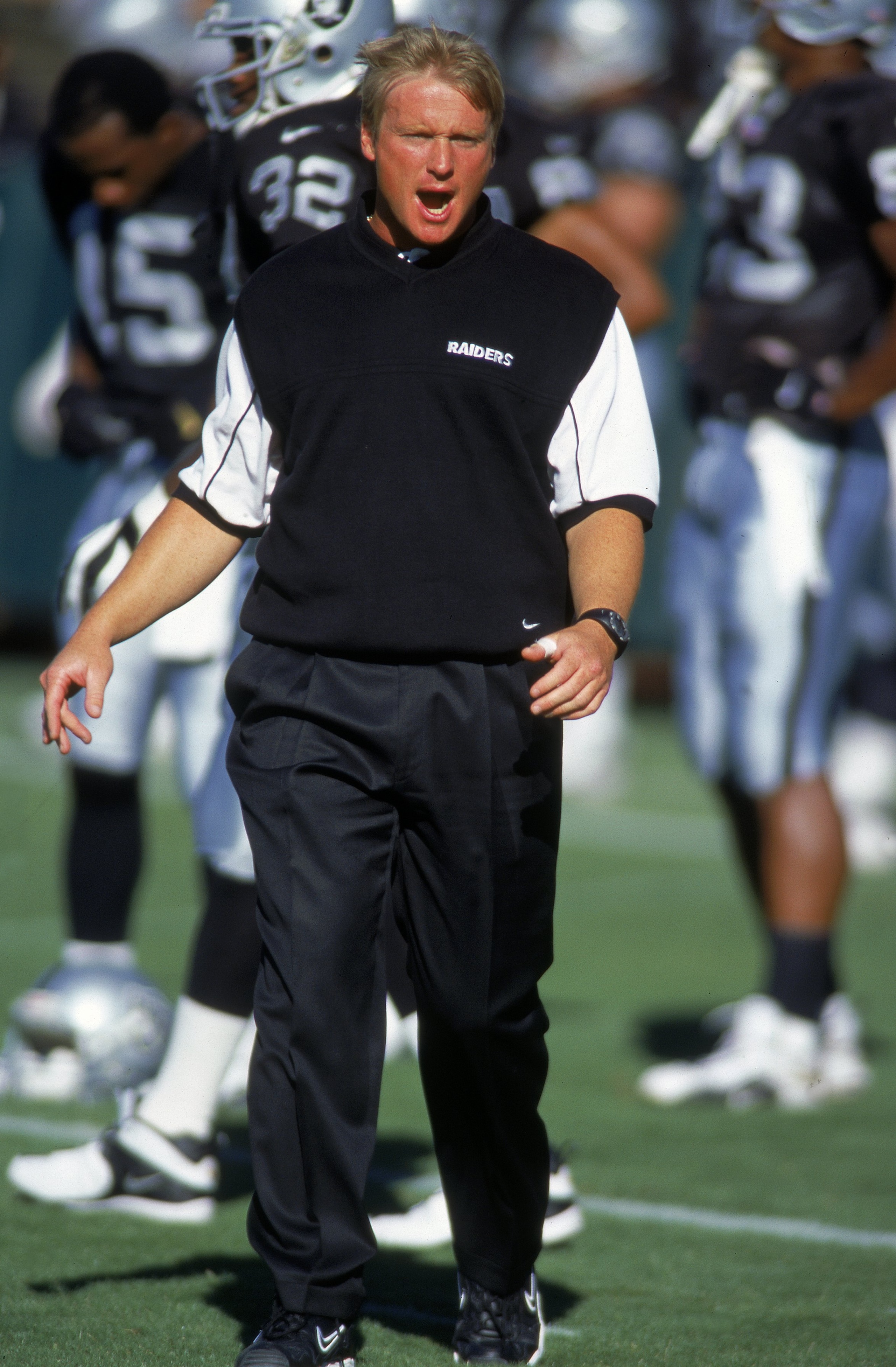 18 Aug 2000:  Head Coach Jon Gruden of the Oakland Raiders calls out to some players during the game against the Detroit Lions at the Network Associates Coliseum in Oakland, California.  The Raiders defeated the Lions 23-17.Mandatory Credit: Jed Jacobsohn