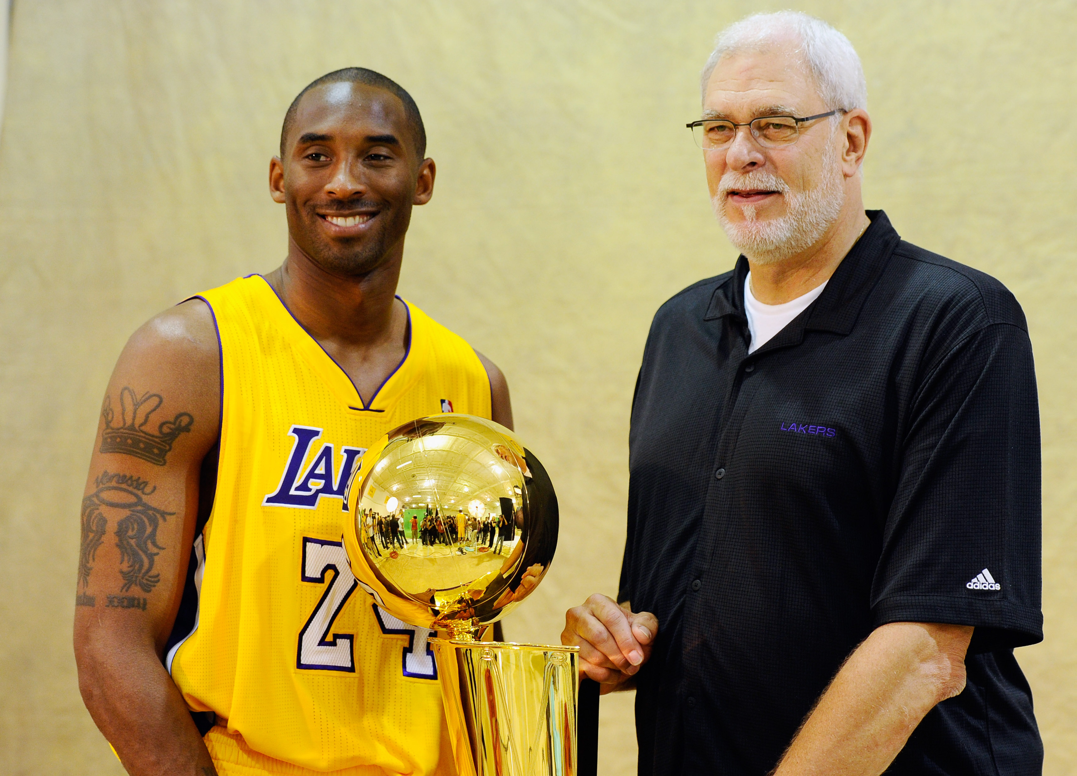 EL SEGUNDO, CA - SEPTEMBER 25: Kobe Bryant #24 and head coach Phil Jackson of the Los Angeles Lakers pose with NBA Finals Larry O'Brien Championship Trophy during Media Day at the Toyota Center on September 25, 2010 in El Segundo, California. NOTE TO US EL SEGUNDO, CA - SEPTEMBER 25: Kobe Bryant #24 and head coach Phil Jackson of the Los Angeles Lakers pose with NBA Finals Larry O'Brien Championship Trophy during Media Day at the Toyota Center on September 25, 2010 in El Segundo, California. NOTE TO US