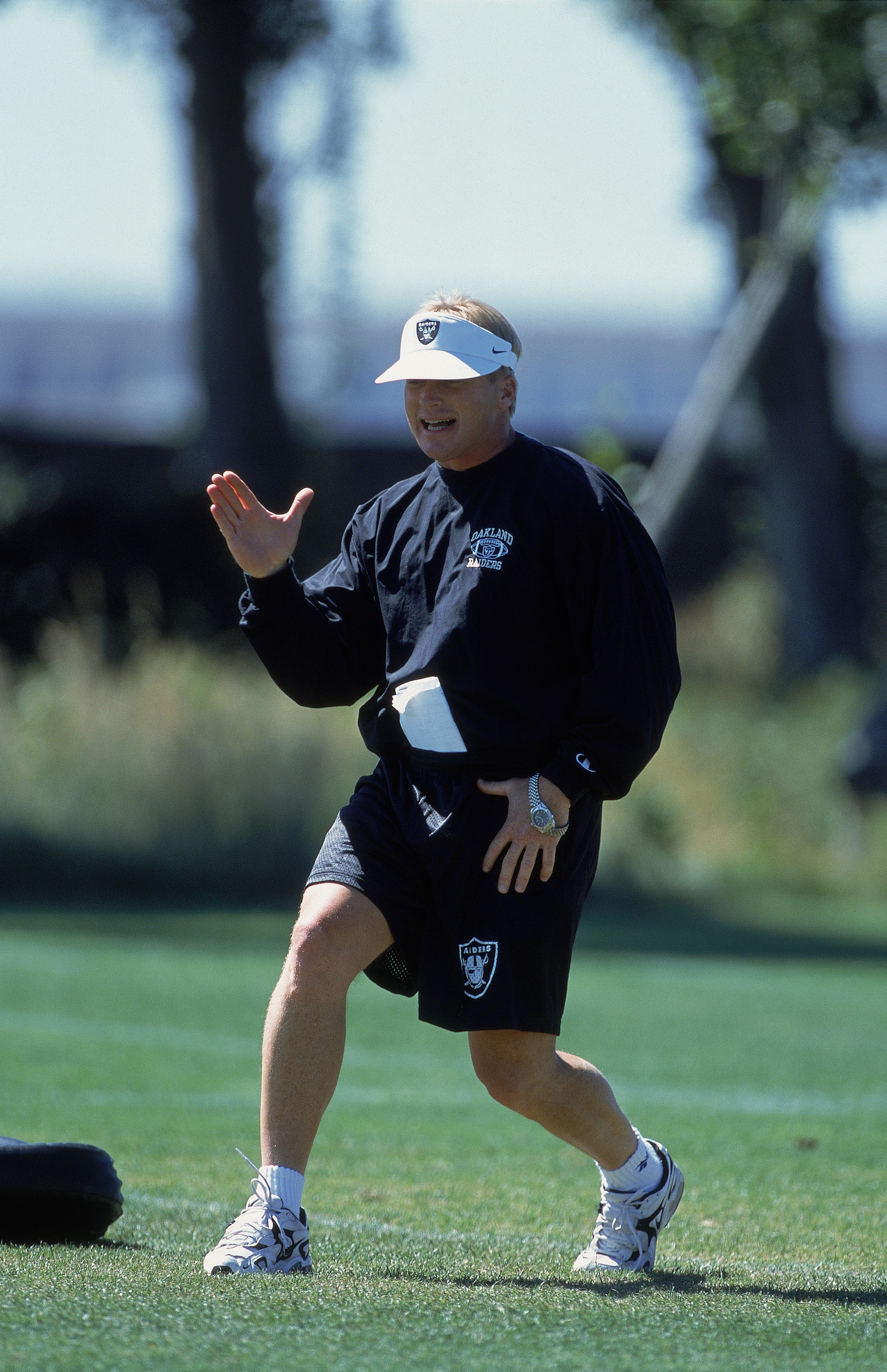 15 Jun 2001:  Head Coach Jon Gruden moves on the field during the Oakland Raiders Training Camp in Alameda, California.Mandatory Credit: Tom Hauck  /Allsport