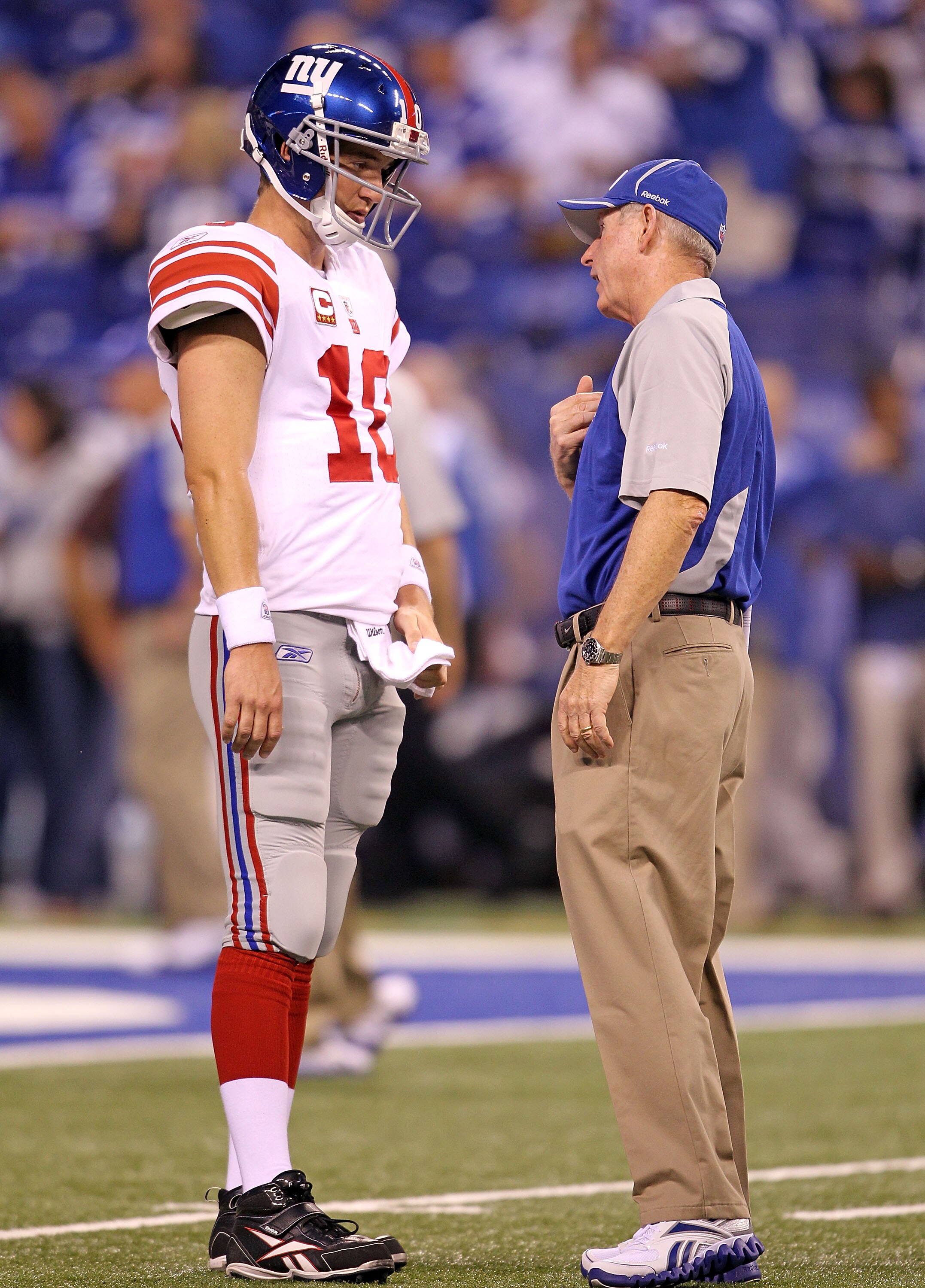 INDIANAPOLIS - SEPTEMBER 19:  Eli Manning #10 of the New York Giants talks with Head Coach Tom Coughlin before the NFL game against the Indianapolis Colts at Lucas Oil Stadium on September 19, 2010 in Indianapolis, Indiana.  (Photo by Andy Lyons/Getty Ima