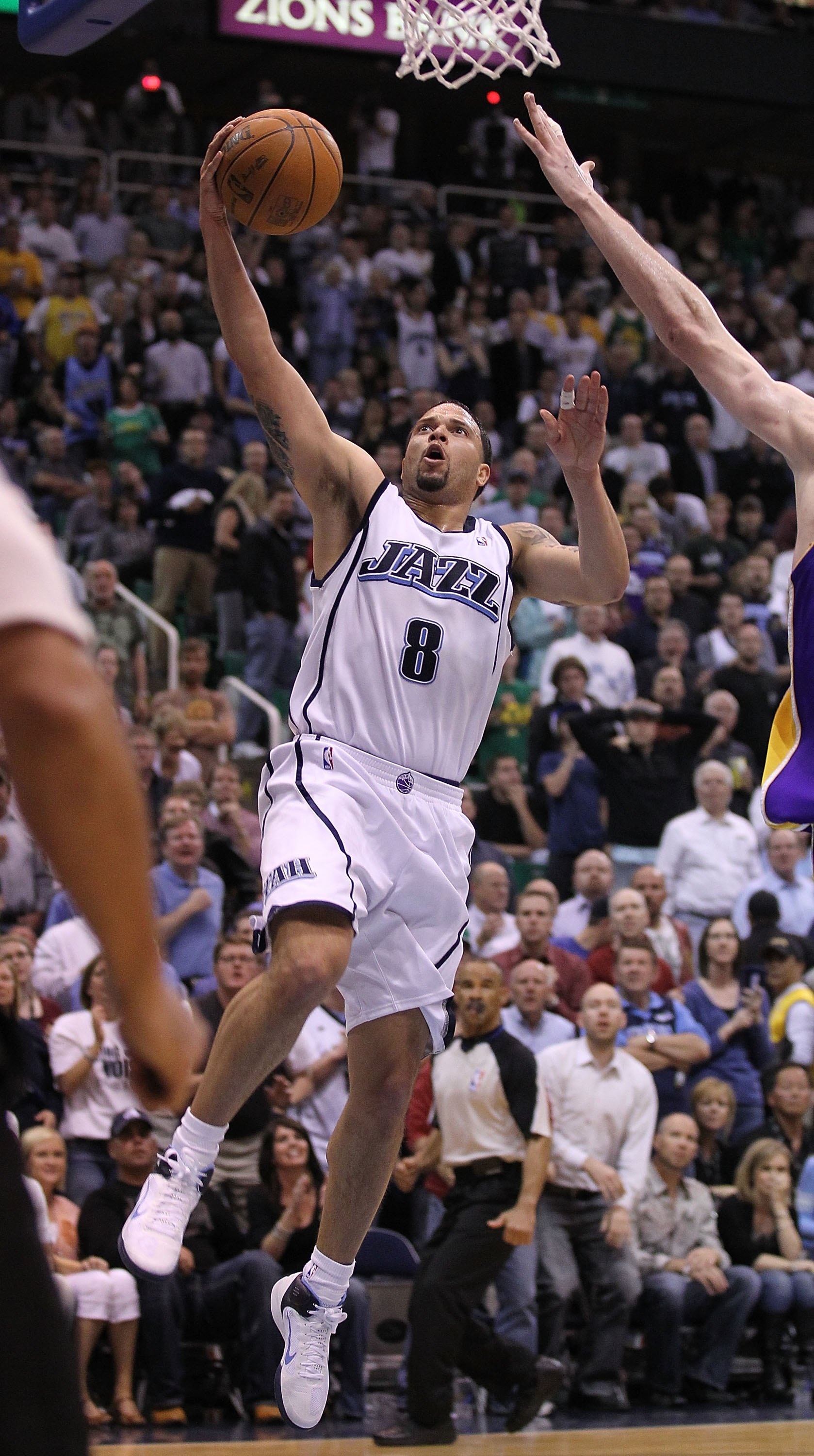 SALT LAKE CITY - MAY 10: Deron Williams #8 of the Utah Jazz in action against the Los Angeles Lakers during Game Four of the Western Conference Semifinals of the 2010 NBA Playoffs on May 10, 2010 at Energy Solutions Arena in Salt Lake City, Utah. NOTE TO SALT LAKE CITY - MAY 10: Deron Williams #8 of the Utah Jazz in action against the Los Angeles Lakers during Game Four of the Western Conference Semifinals of the 2010 NBA Playoffs on May 10, 2010 at Energy Solutions Arena in Salt Lake City, Utah. NOTE TO