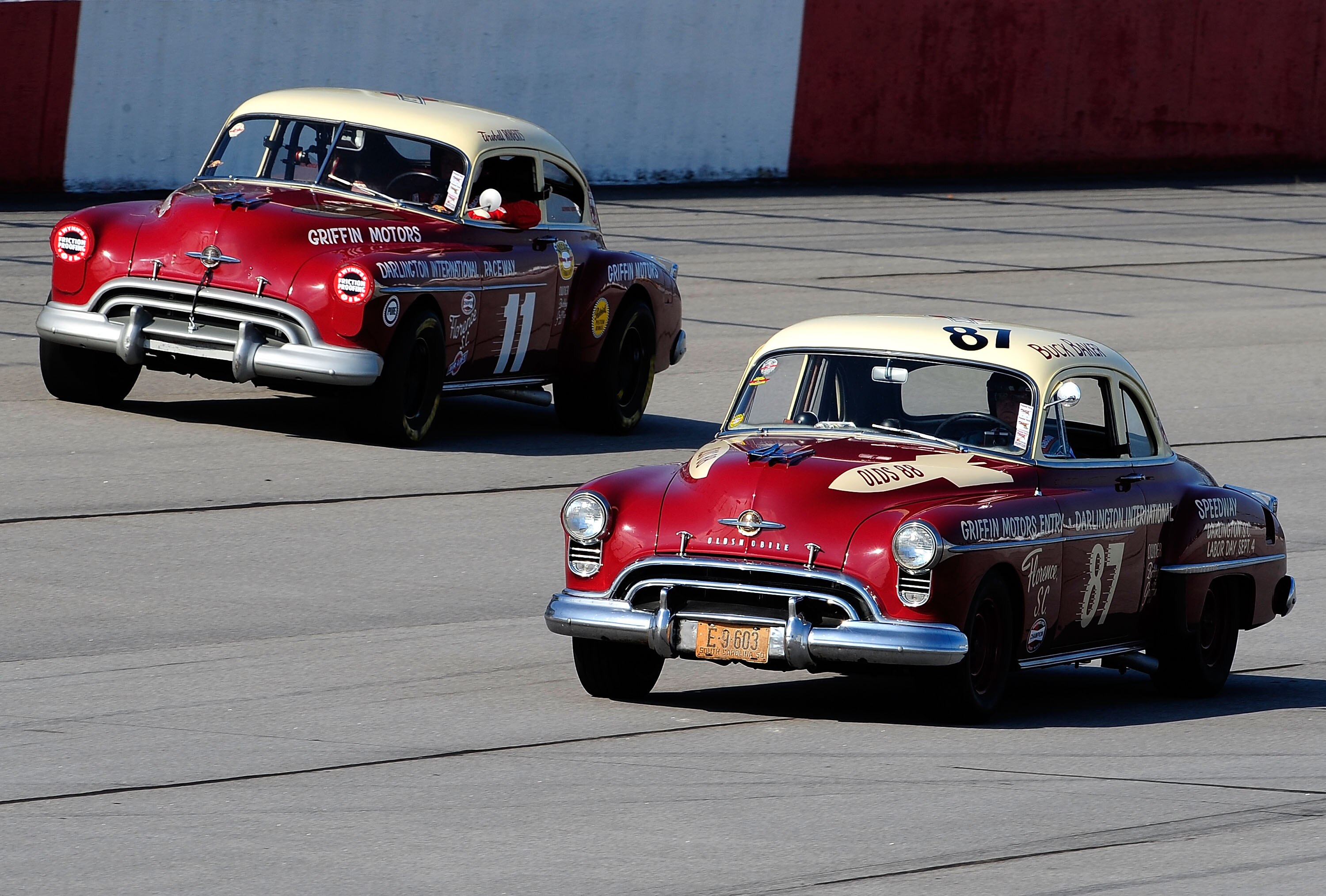 DARLINGTON, SC - SEPTEMBER 25:  Vintage cars drive during the Darlington Historic Racing Festival at Darlington Raceway on September 25, 2010 in Darlington, South Carolina.  (Photo by Rusty Jarrett/Getty Images)