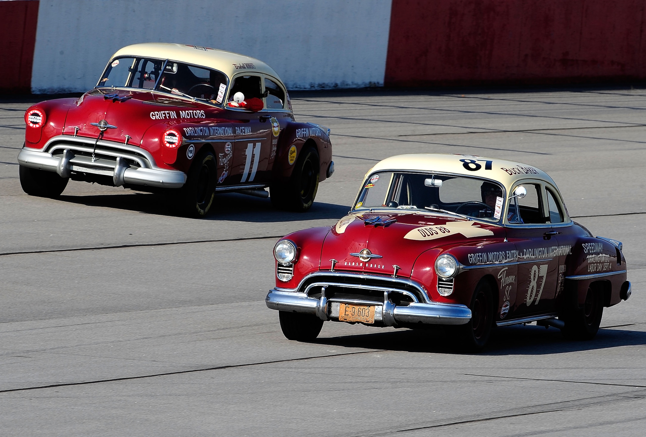 DARLINGTON, SC - SEPTEMBER 25:  Vintage cars drive during the Darlington Historic Racing Festival at Darlington Raceway on September 25, 2010 in Darlington, South Carolina.  (Photo by Rusty Jarrett/Getty Images)