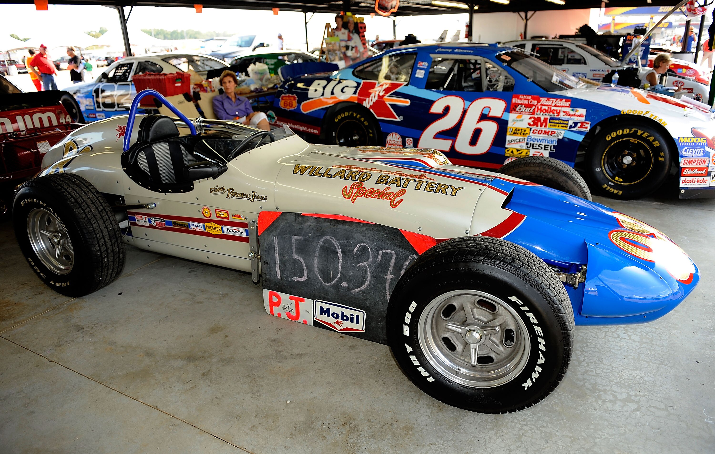 DARLINGTON, SC - SEPTEMBER 25:  Vintage Indy Cars on display in the garage area during the Darlington Historic Racing Festival at Darlington Raceway on September 25, 2010 in Darlington, South Carolina.  (Photo by Rusty Jarrett/Getty Images)
