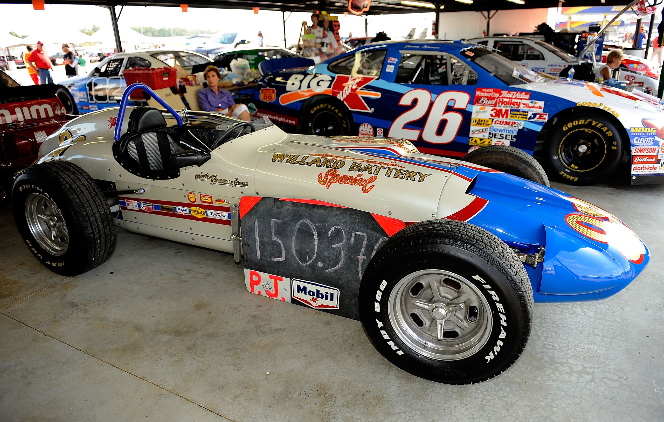 DARLINGTON, SC - SEPTEMBER 25:  Vintage Indy Cars on display in the garage area during the Darlington Historic Racing Festival at Darlington Raceway on September 25, 2010 in Darlington, South Carolina.  (Photo by Rusty Jarrett/Getty Images)