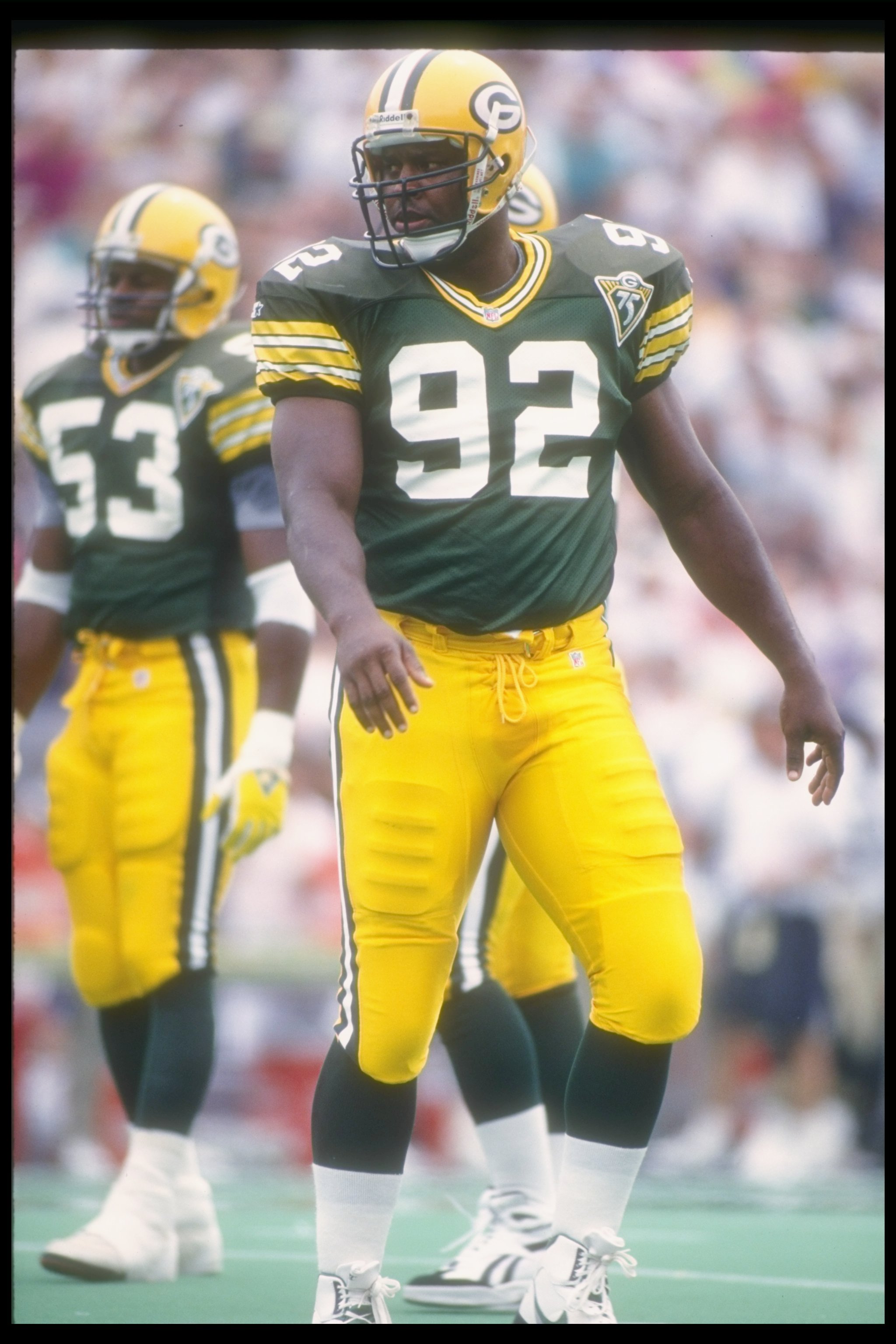 14 Aug 1993:  Defensive lineman Reggie White of the Green Bay Packers looks on during a pre-season game against the New Orleans Saints at Camp Randall Stadium in Madison, Wisconsin.  The Saints won the game, 26-17. Mandatory Credit: Jonathan Daniel  /Alls