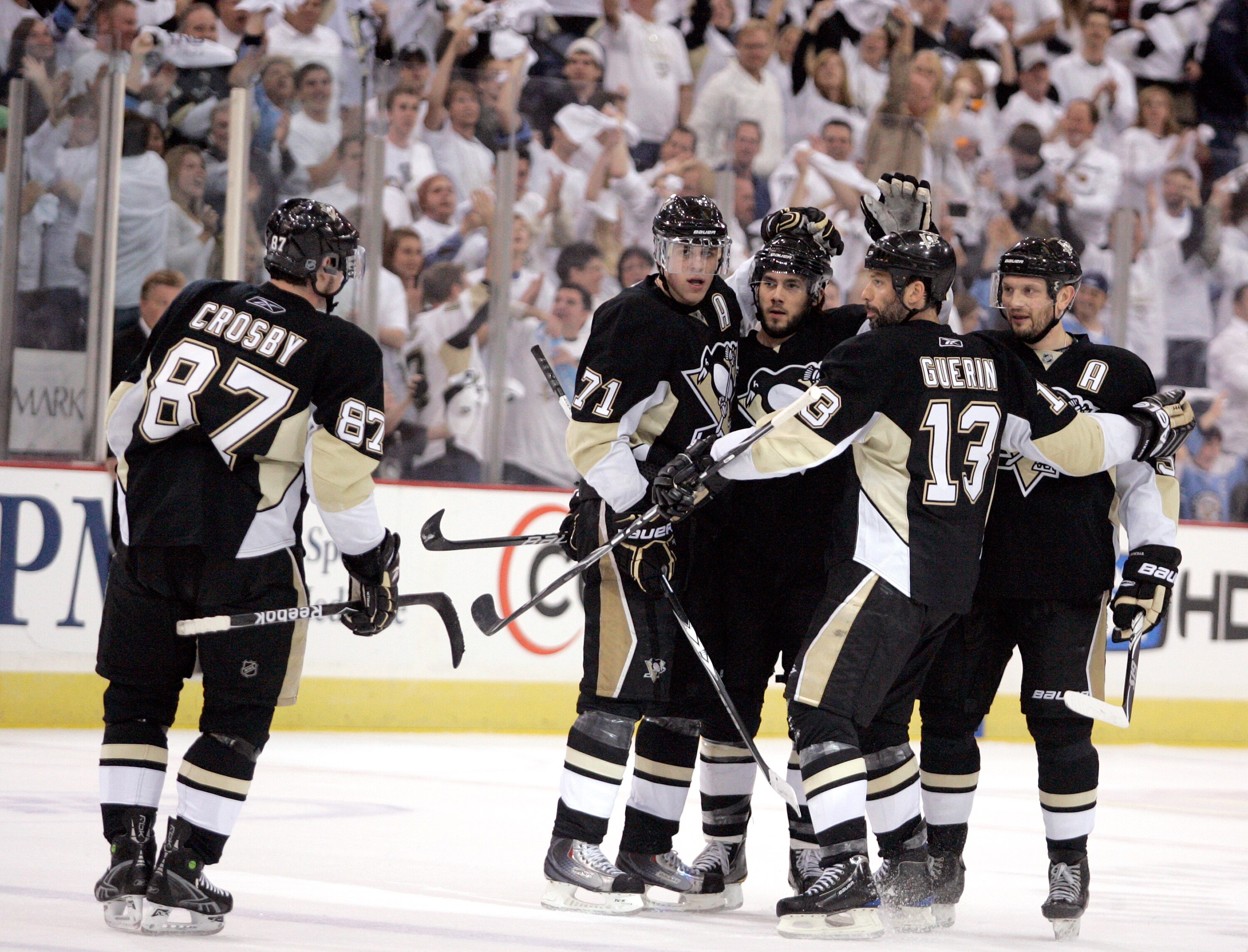 PITTSBURGH - MAY 8:  Kris Letang #58 of the Pittsburgh Penguins celebrates his power play goal with teammates agains the Montreal Canadiens in Game Five of the Eastern Conference Semifinals during the 2010 NHL Stanley Cup Playoffs at Mellon Arena on May 8