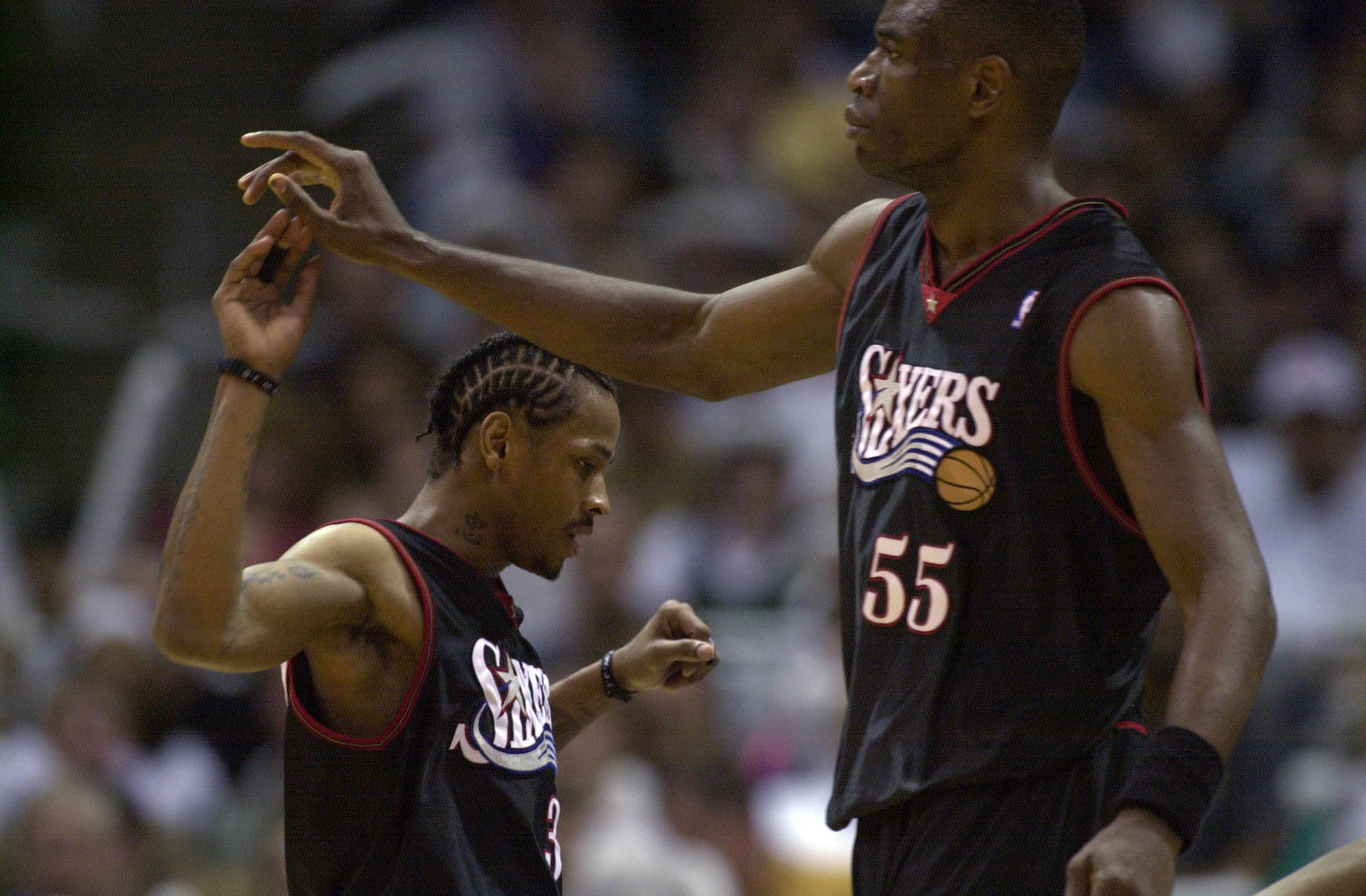 28 May 2001:  Allen Iverson #3 and Dikembe Mutombo #55 of the Philadelphia 76ers celebrate in game four of the eastern conference finals against the Milwaukee Bucks at the Bradley Center in Milwaukee, Wisconsin.  The Bucks won 110-100. DIGITAL IMAGE.  Man