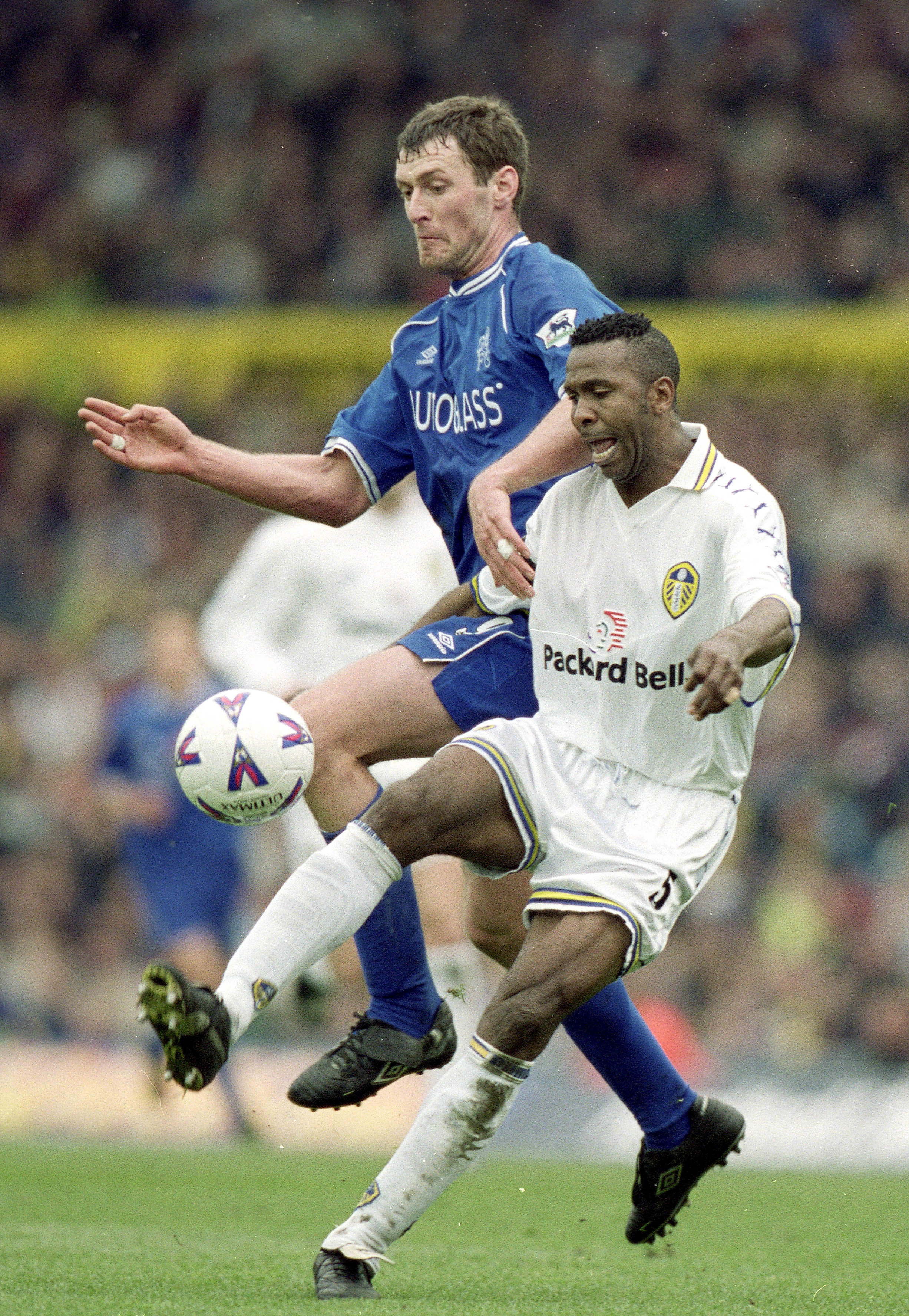1 Apr 2000:  Chris Sutton of Chelsea challenges Lucas Radebe of Leeds United during the FA Carling Premiership match at Elland Road in Leeds, England.  Chelsea won the match 1-0. \ Mandatory Credit:  Ben Radford/Allsport