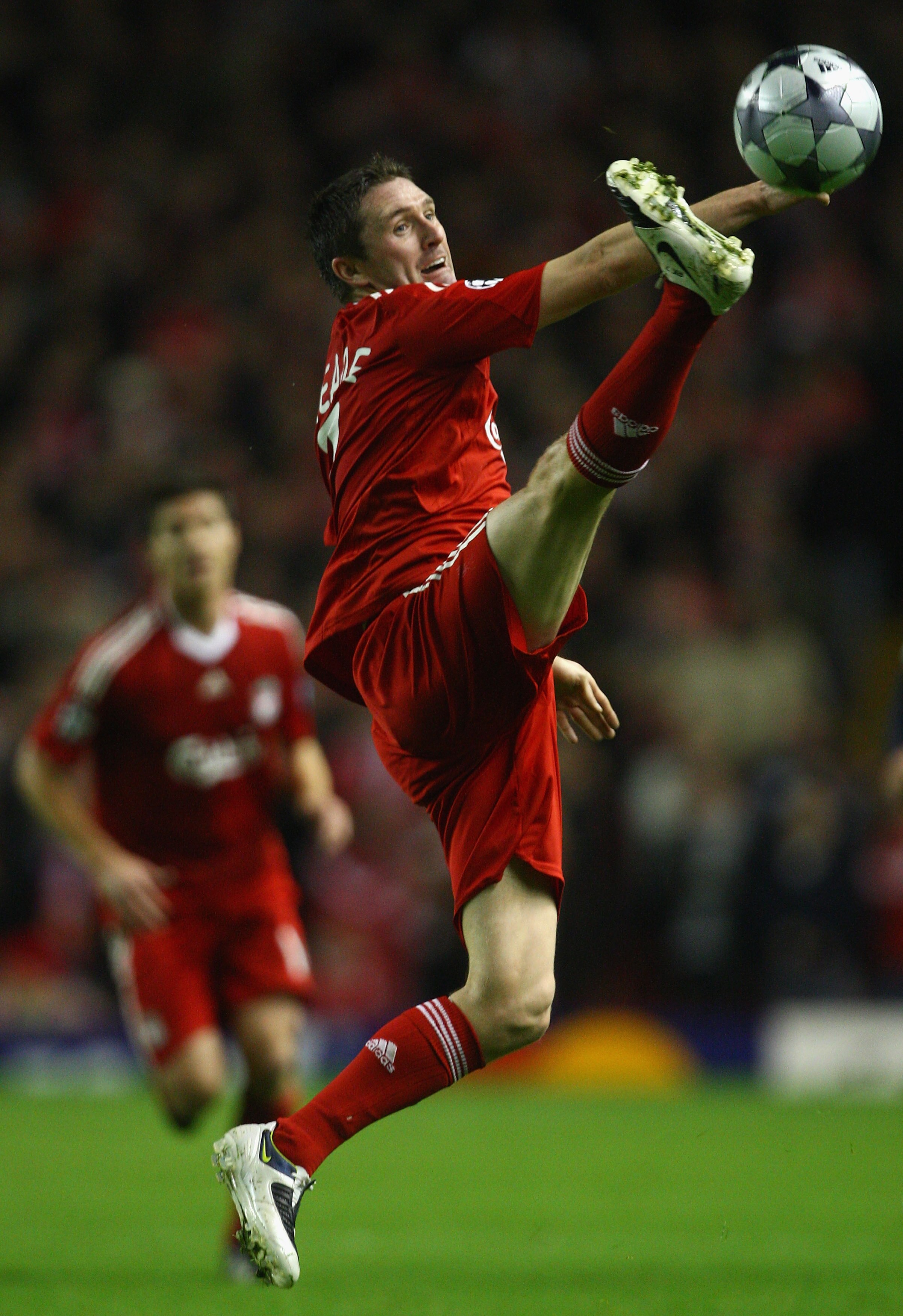 LIVERPOOL, UNITED KINGDOM - NOVEMBER 04:  Robbie Keane of Liverpool stretches for the ball during the UEFA Champions League Group D match between Liverpool and Atletico Madrid at Anfield on November 4, 2008 in Liverpool, England. (Photo by Laurence Griffi