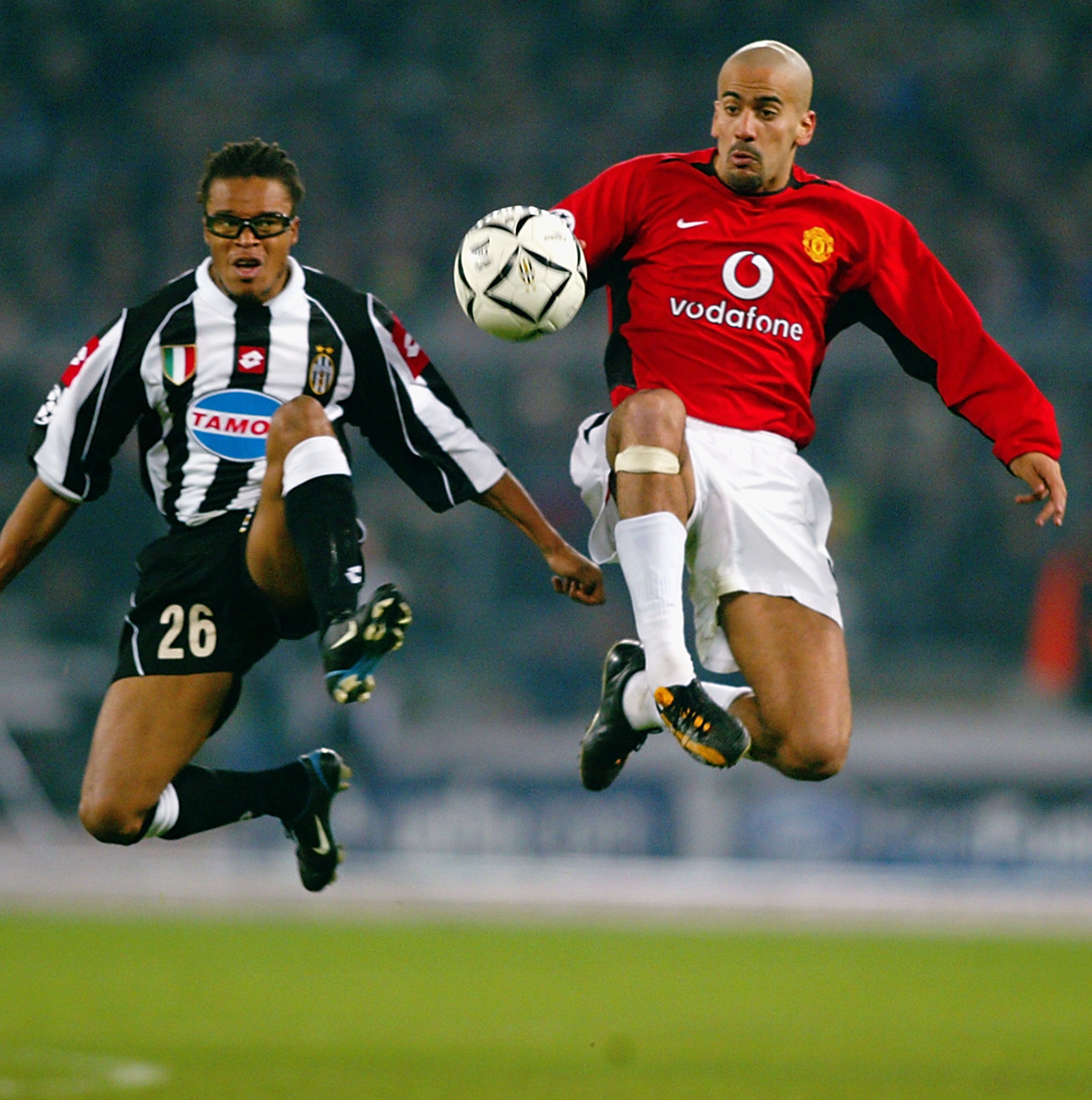 TURIN - FEBRUARY 25:  (FILE PHOTO) Juan Sebastian Veron of Manchester United wins the ball ahead of Edgar Davids of Juventus during the UEFA Champions League Second Phase Group D match held on February 25, 2003 at the Stadio Delle Alpi, in Turin, Italy. M