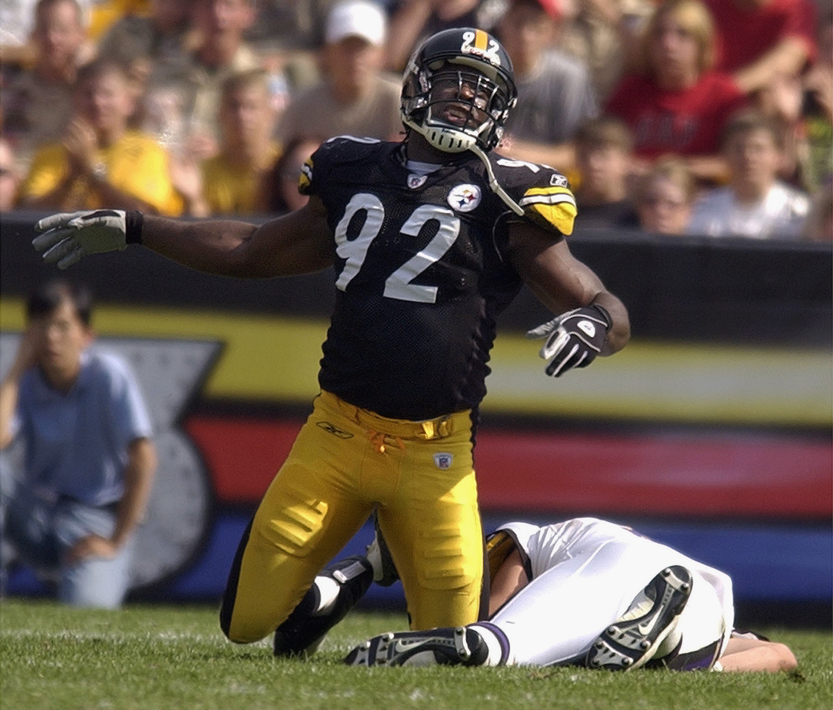 PITTSBURGH - SEPTEMBER 7: Linebacker Jason Gildon #92 of the Pittsburgh Steelers celebrates a sack on quarterback Kyle Boller of the Baltimore Ravens on September 7, 2003 at Heinz Field in Pittsburgh, Pennsylvania.  The Steelers defeated the Ravens 34-15.