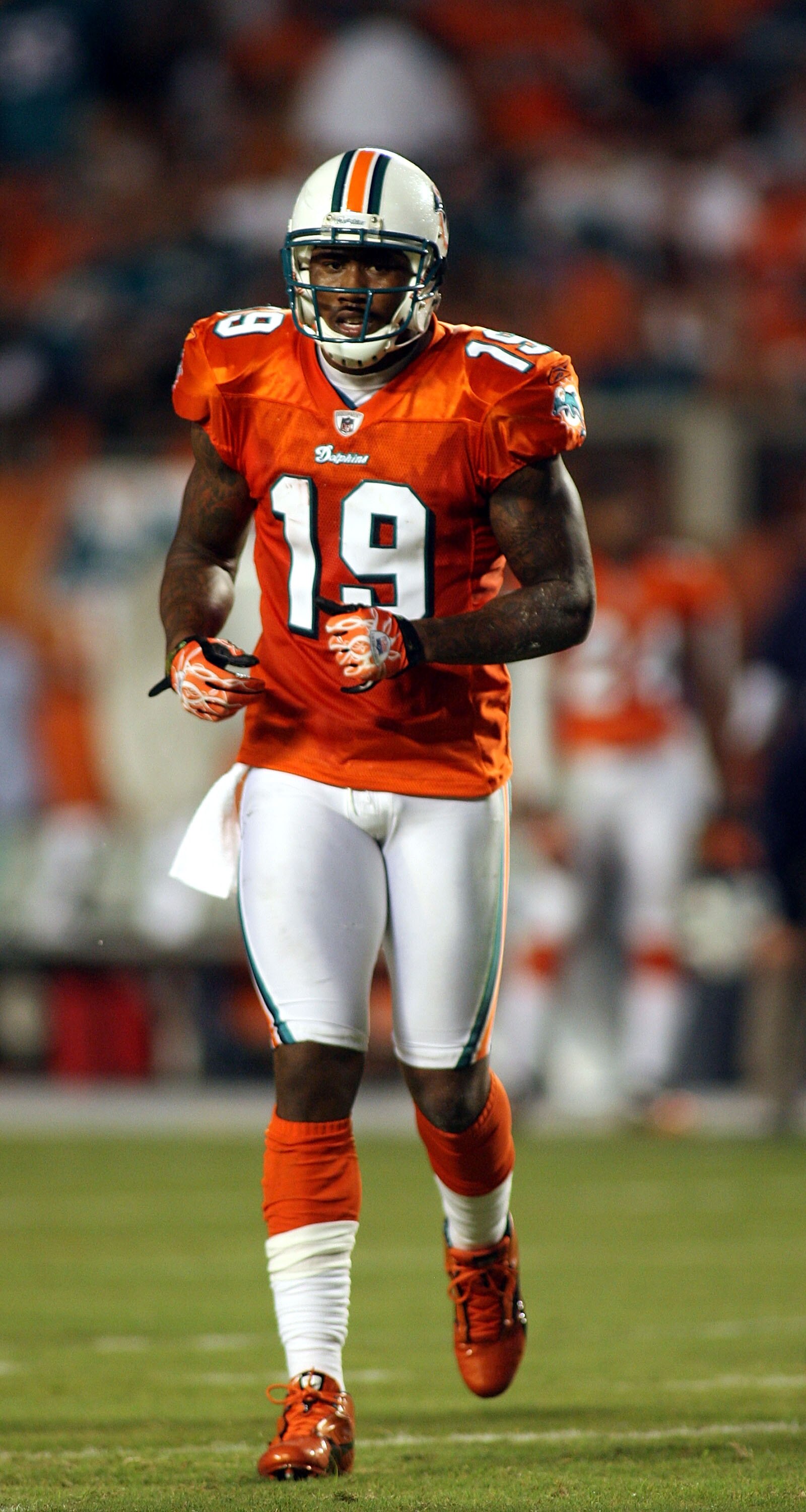MIAMI - SEPTEMBER 26: Receiver Brandon Marshall #19 of the Miami Dolphins shouts during a game against the New York Jets at Sun Life Stadium on September 26, 2010 in Miami, Florida. (Photo by Marc Serota/Getty Images)