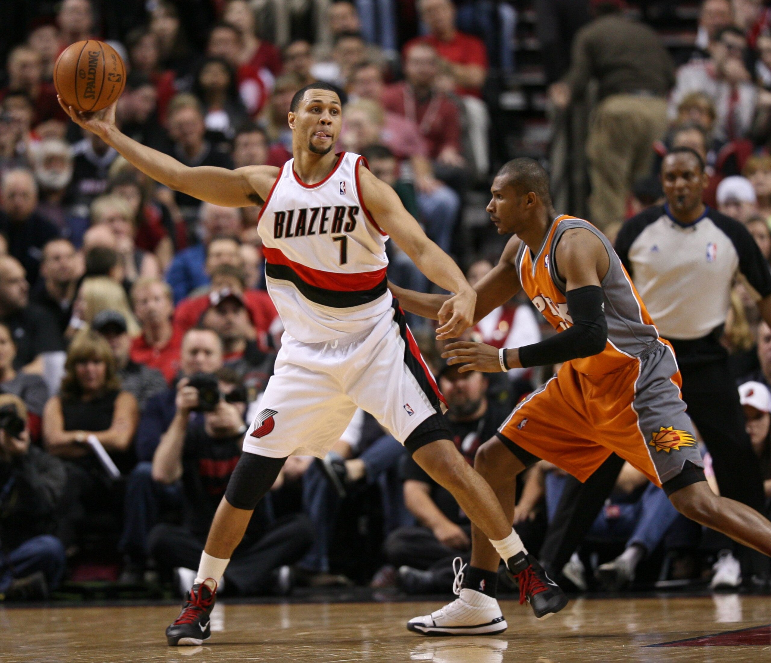 PORTLAND, OR - APRIL 24: Brandon Roy #7 of the Portland Trail Blazers catches a pass against Leandro Barbosa #10 of the Phoenix Suns during Game Four of the Western Conference Quarterfinals of the NBA Playoffs on April 24, 2010 at the Rose Garden in Port PORTLAND, OR - APRIL 24: Brandon Roy #7 of the Portland Trail Blazers catches a pass against Leandro Barbosa #10 of the Phoenix Suns during Game Four of the Western Conference Quarterfinals of the NBA Playoffs on April 24, 2010 at the Rose Garden in Port