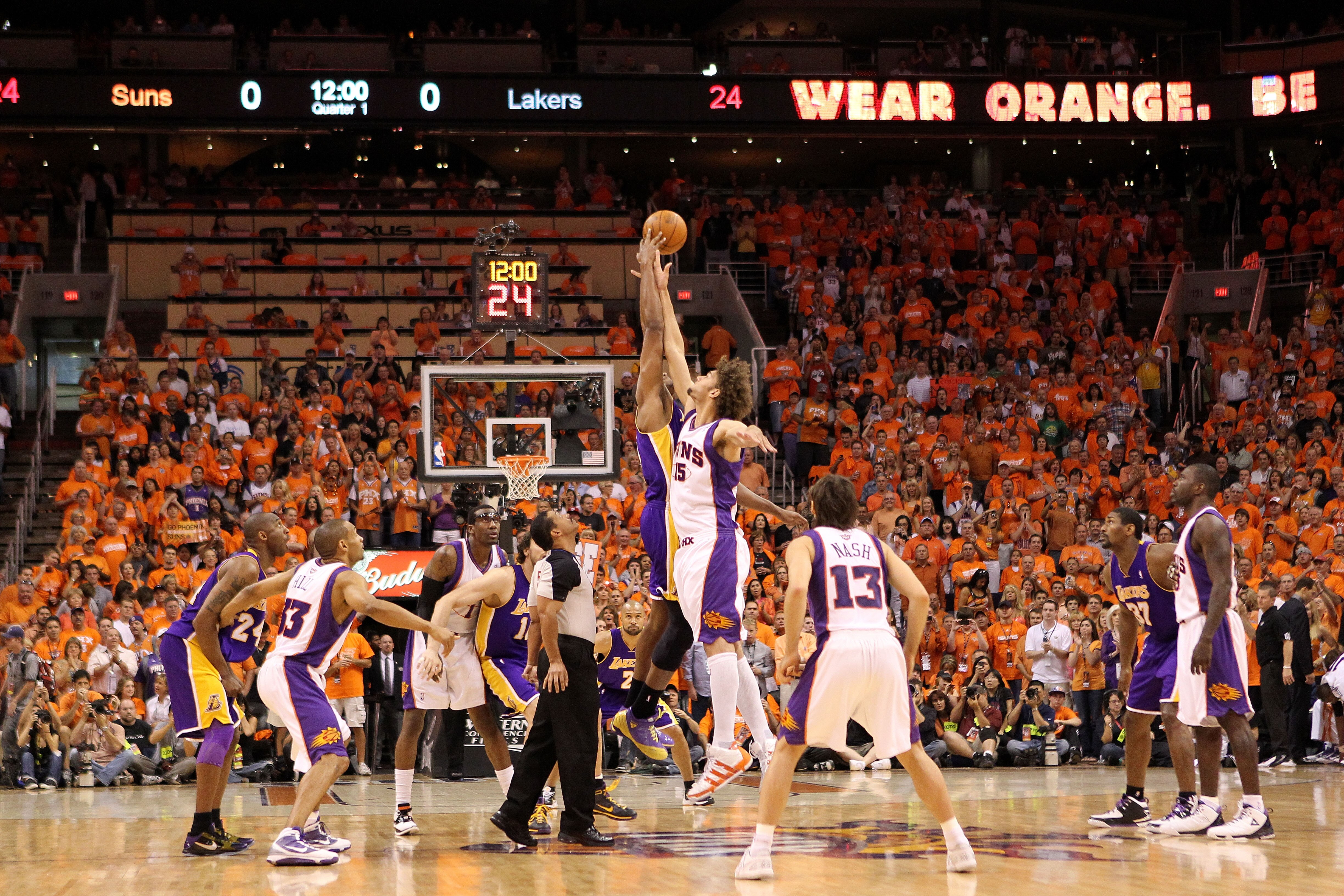 PHOENIX - MAY 29:  Robin Lopez #15 of the Phoenix Suns tips the ball off against Andrew Bynum #17 of the Los Angeles Lakers in the first quarter of Game Six of the Western Conference Finals during the 2010 NBA Playoffs at US Airways Center on May 29, 2010