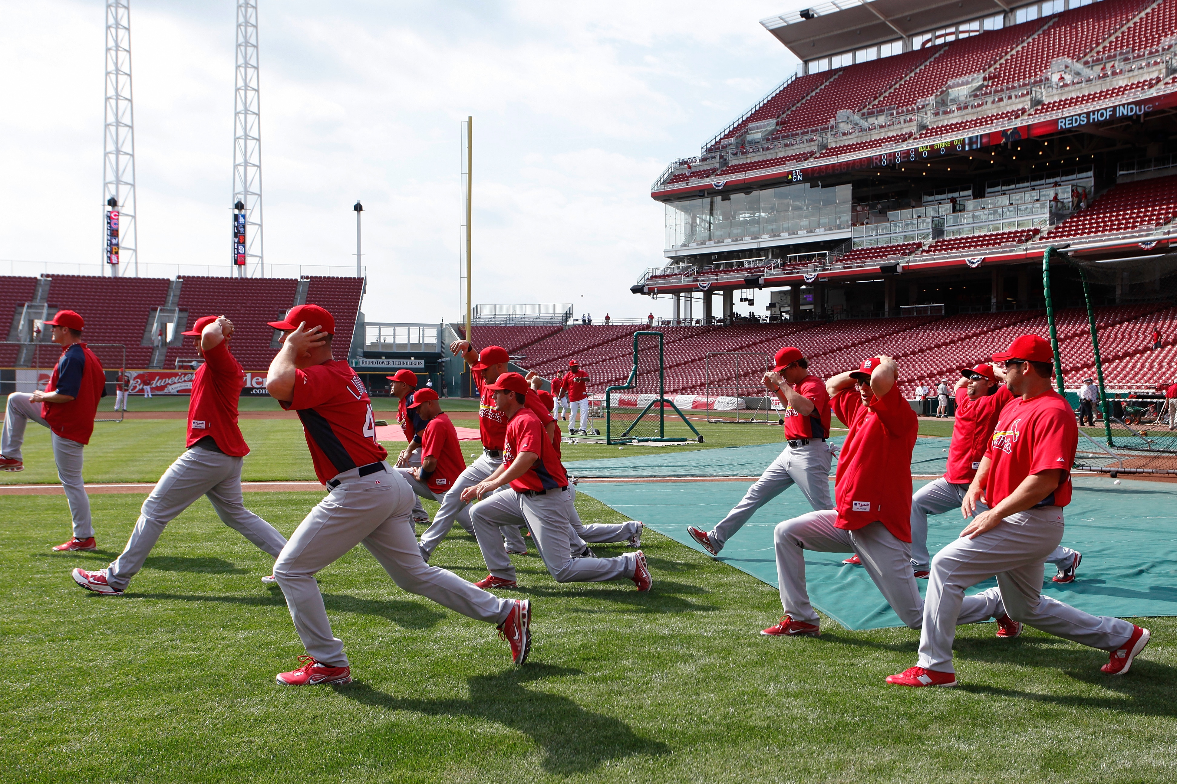 CINCINNATI, OH - APRIL 5: A group of St. Louis Cardinals players stretch before the opening day game against the Cincinnati Reds at the Great American Ball Park on March 5, 2010 in Cincinnati, Ohio. (Photo by Joe Robbins/Getty Images)