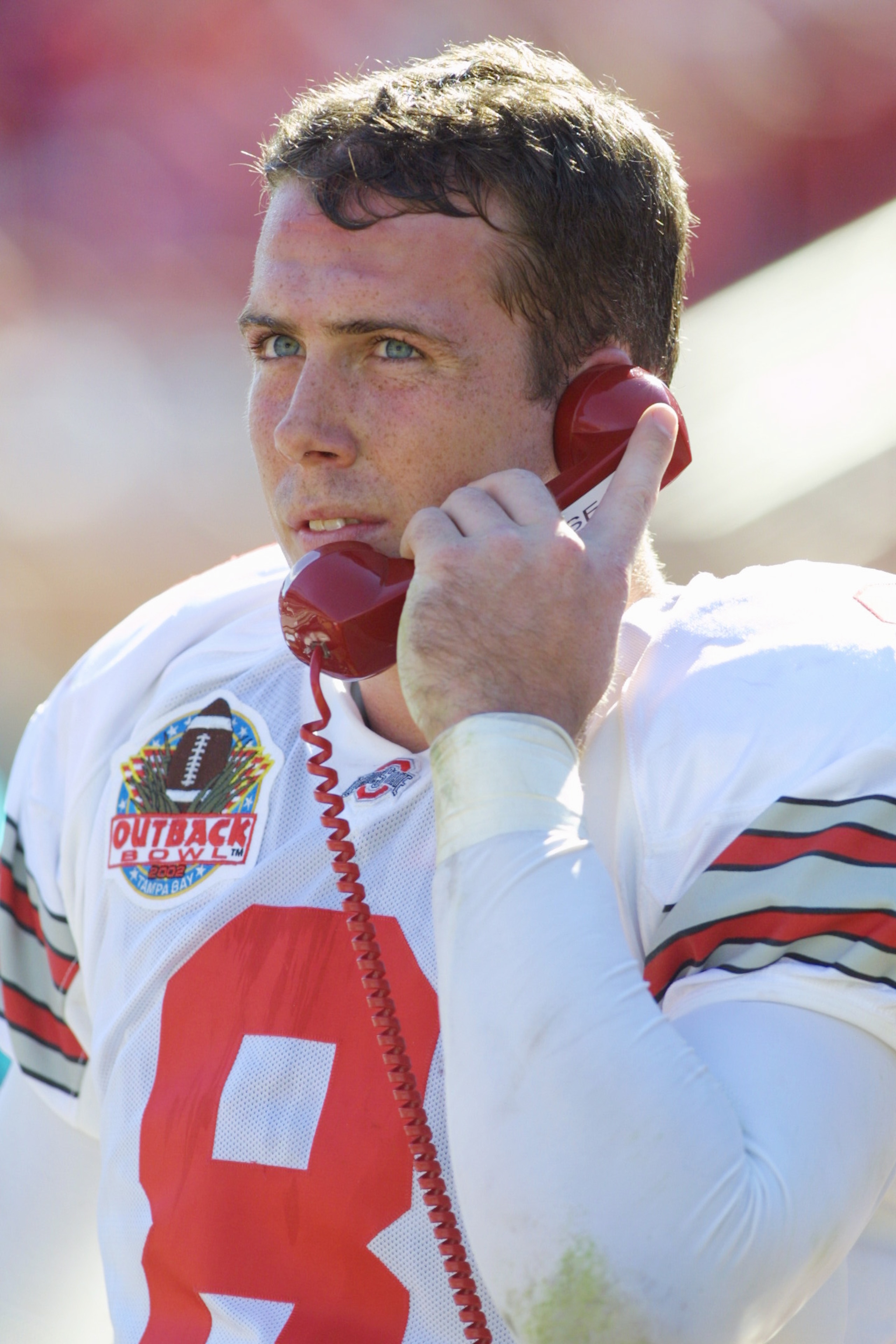 1 Jan 2002:  Ohio State quarterback Steve Bellisari, #8 talks on the phone to coaches against South Carolina in the Outback Bowl at Raymond James Stadium in Tampa, Florida.  USC won 31-28.  DIGITAL IMAGE. Mandatory Credit: Scott Halleran/Getty Images