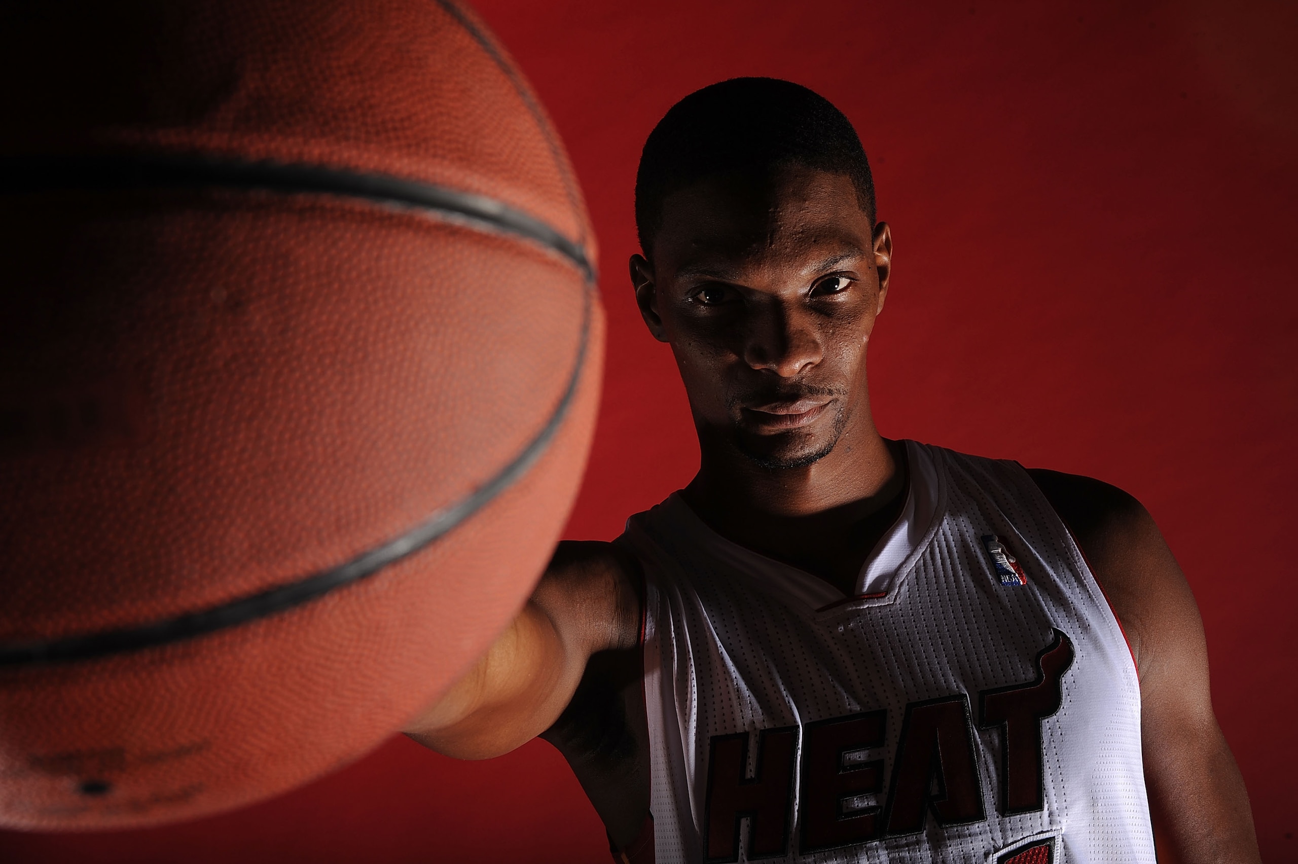 MIAMI - SEPTEMBER 27:  Chris Bosh #1 of the Miami Heat pose for photos during media day at the Bank United Center on September 27, 2010 in Miami, Florida. NOTE TO USER: User expressly acknowledges and agrees that, by downloading and/or using this Photogra