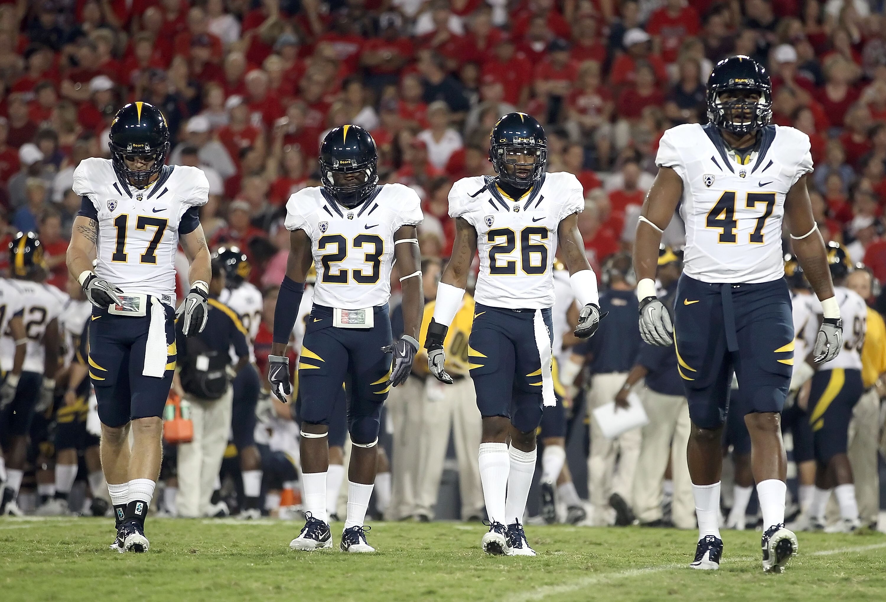 TUCSON, AZ - SEPTEMBER 25:  (L-R) Chris Conte #17, Josh Hill #23, Darian Hagan #26 and Keith Browner #47 of the California Goldeb Bears during the college football game against the Arizona Wildcats at Arizona Stadium on September 25, 2010 in Tucson, Arizo