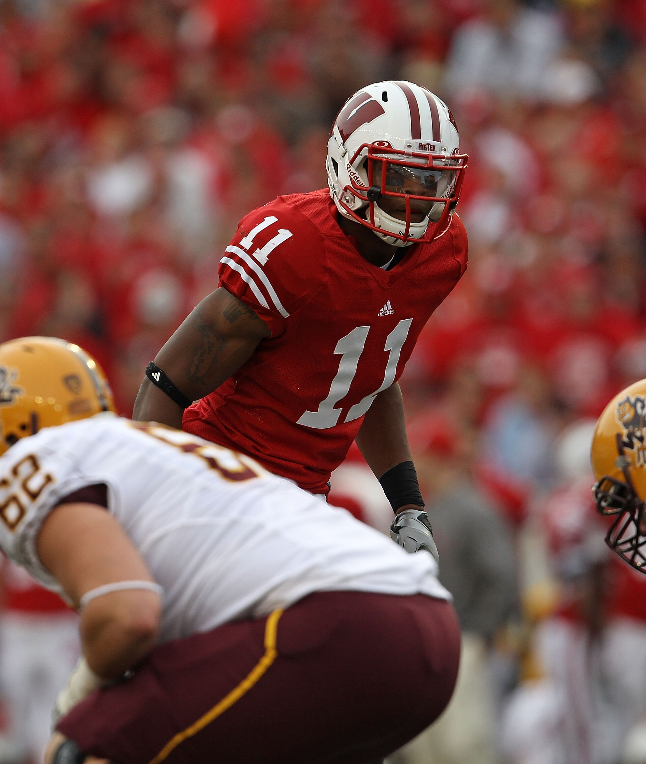 MADISON, WI - SEPTEMBER 18: David Gilbert #11 of the Wisconsin Badgers awaits the start of play against the Arizona State Sun Devils at Camp Randall Stadium on September 18, 2010 in Madison, Wisconsin. Wisconsin defeated Arizona State 20-19. (Photo by Jon