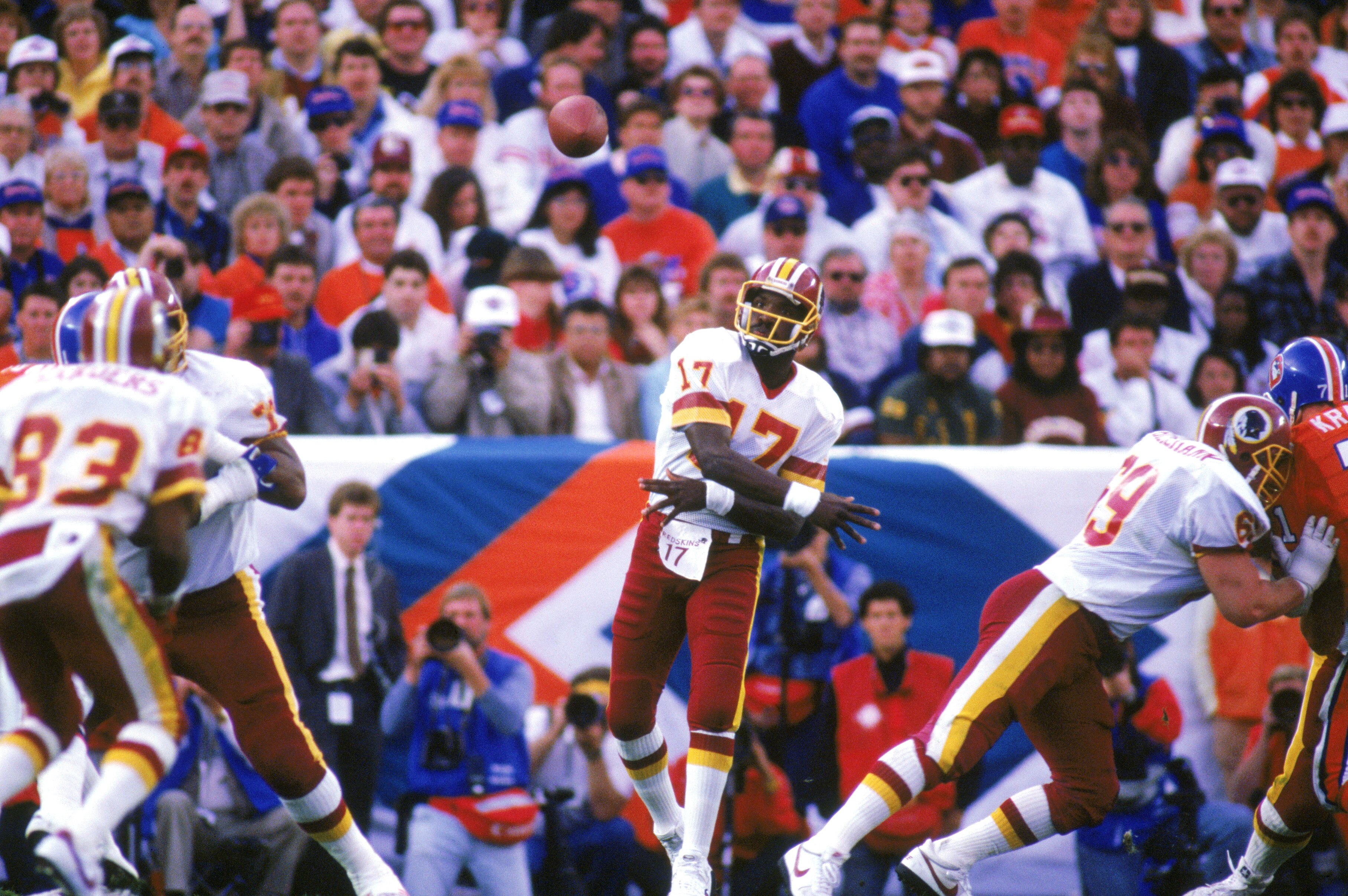 SAN DIEGO - JANUARY 31:  Quarterback Doug Williams #17 of the Washington Redskins passes during Super Bowl XXII against the Denver Broncos at Jack Murphy Stadium on January 31, 1988 in San Diego, California.  The Redskins won 42-10.  (Photo by Stephen Dun