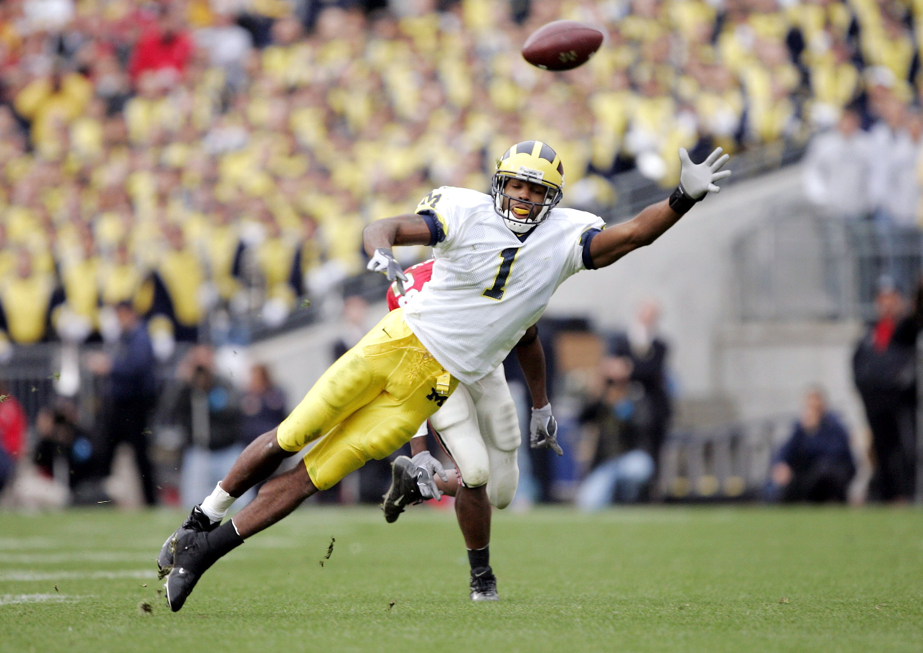 COLUMBUS, OH - NOVEMBER 20:  Wide receiver Braylon Edwards #1 of the Michigan Wolverines is unable to reach a pass against the Ohio State Buckeyes during the third quarter on November 20, 2004 at Ohio Stadium in Columbus, Ohio.  Ohio State upset Michigan