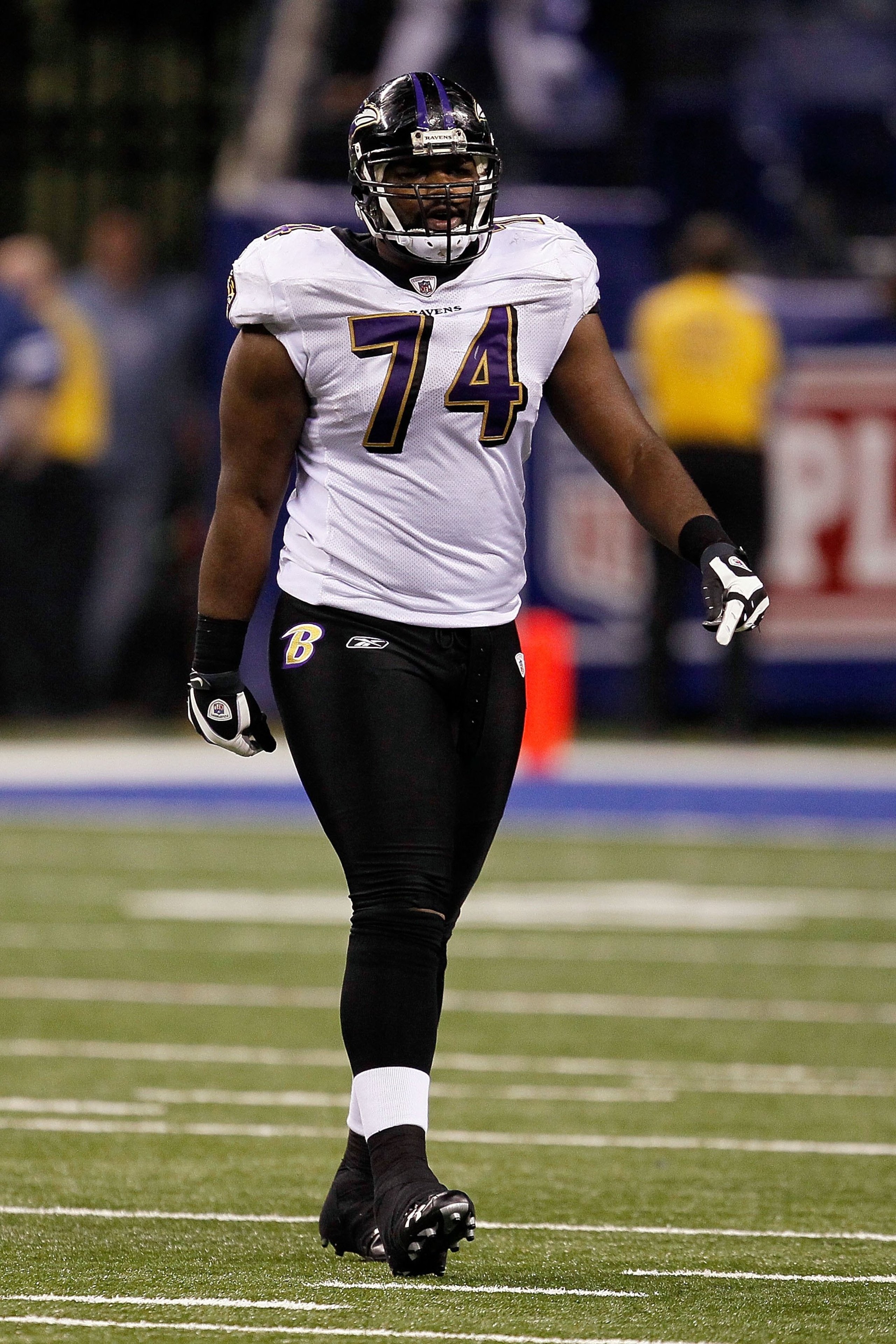 INDIANAPOLIS - JANUARY 16:  Michael Oher #74 of the Baltimore Ravens looks on against the Indianapolis Colts in the AFC Divisional Playoff Game at Lucas Oli Stadium on January 16, 2010 in Indianapolis, Indiana.  The Colts defeated the Ravens 20-3.  (Photo