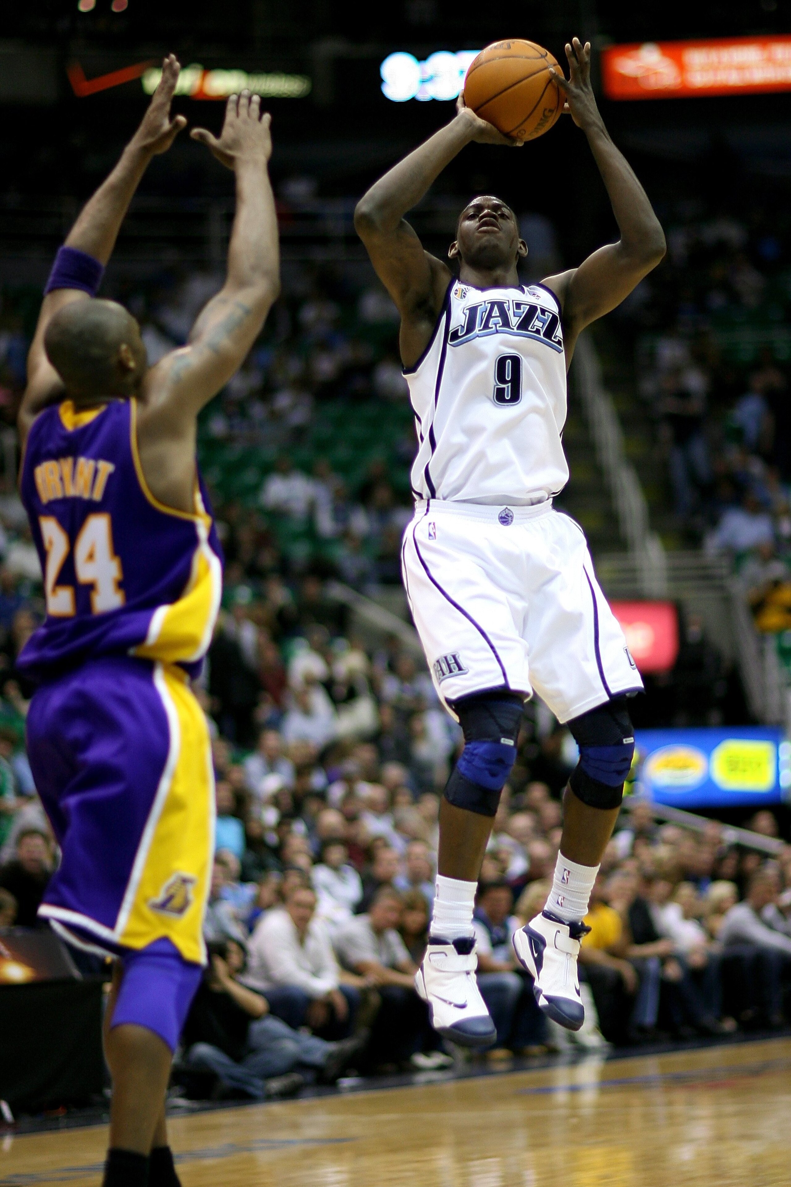SALT LAKE CITY - APRIL 25:  Ronnie Brewer #9 of the Utah Jazz goes up for a shot over Kobe Bryant #24 of the Los Angeles Lakers in Game Four of the Western Conference Quarterfinals during the 2009 NBA Playoffs at Energy Solutions Arena on April 25, 2009 i