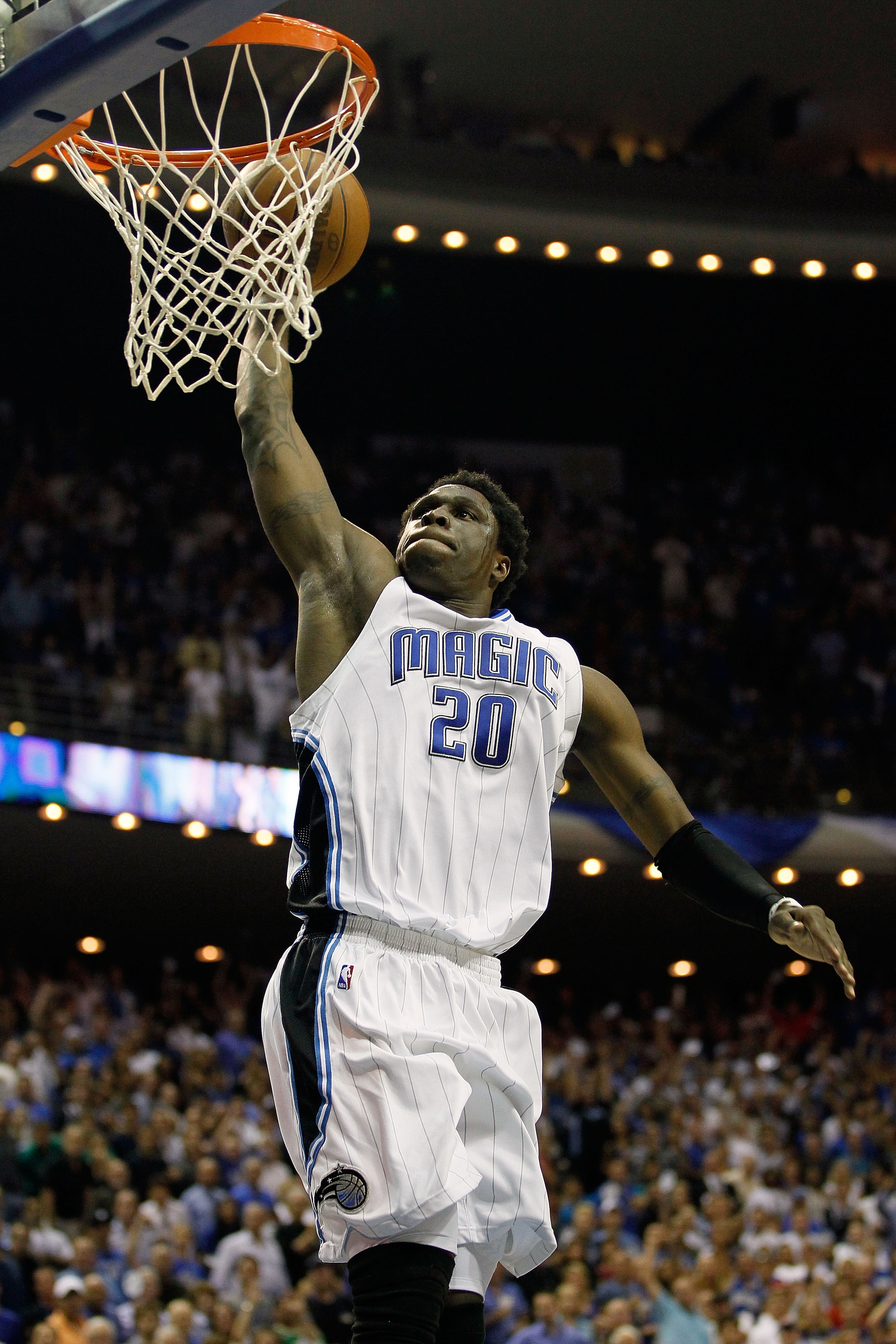 ORLANDO, FL - MAY 26:  Mickael Pietrus #20 of the Orlando Magic dunks against the Boston Celtics in Game Five of the Eastern Conference Finals during the 2010 NBA Playoffs at Amway Arena on May 26, 2010 in Orlando, Florida. The Magic won 113-92. NOTE TO U