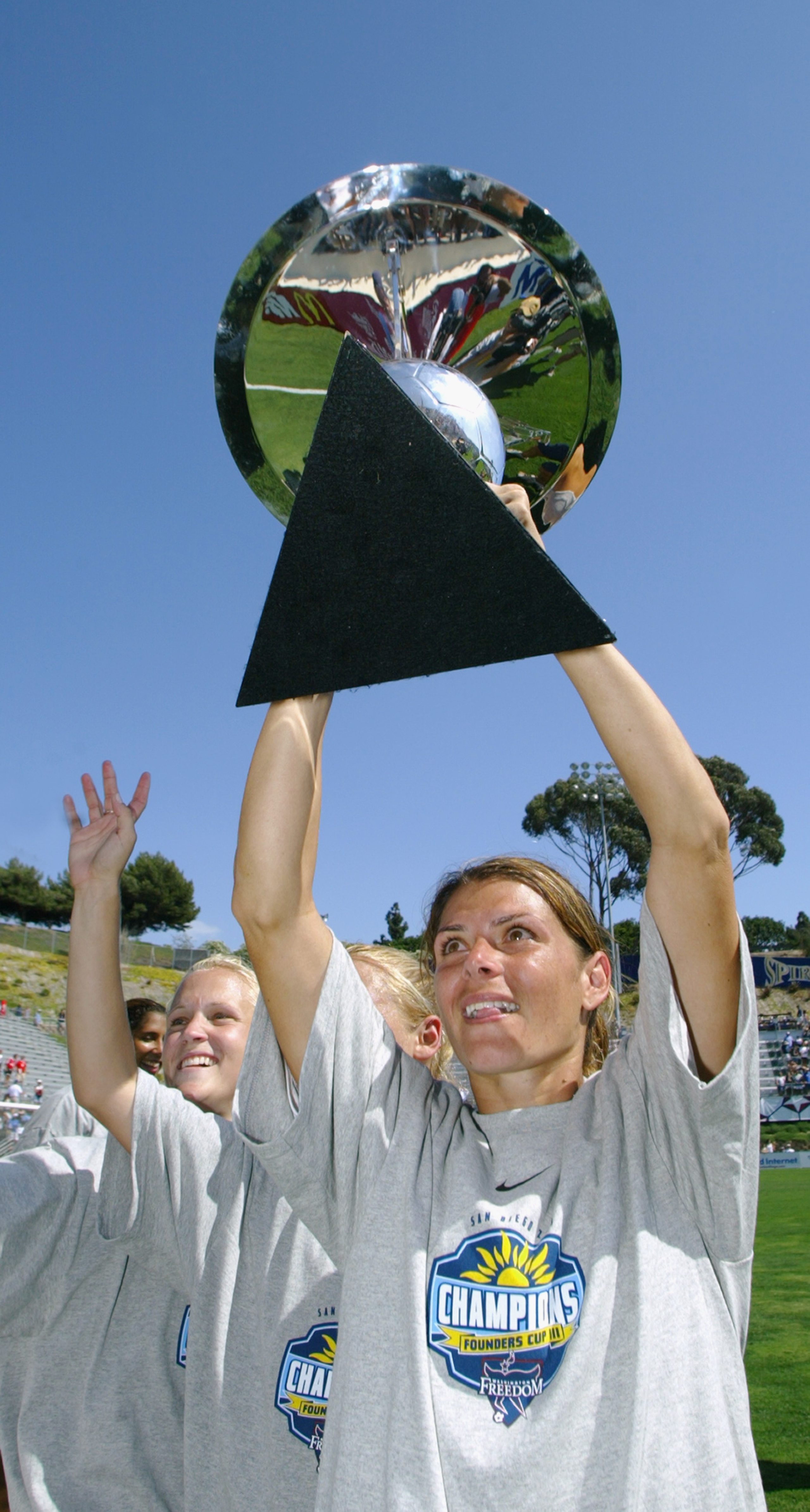 SAN DIEGO - AUGUST 24:  (FILE PHOTO)  Mia Hamm #9 of the Washington Freedom holds the Founders Cup high after their victory over the Atlanta Beat in the Founders Cup Championship Match on August 24, 2003 at Torero Stadium in San Diego, California. The WUS