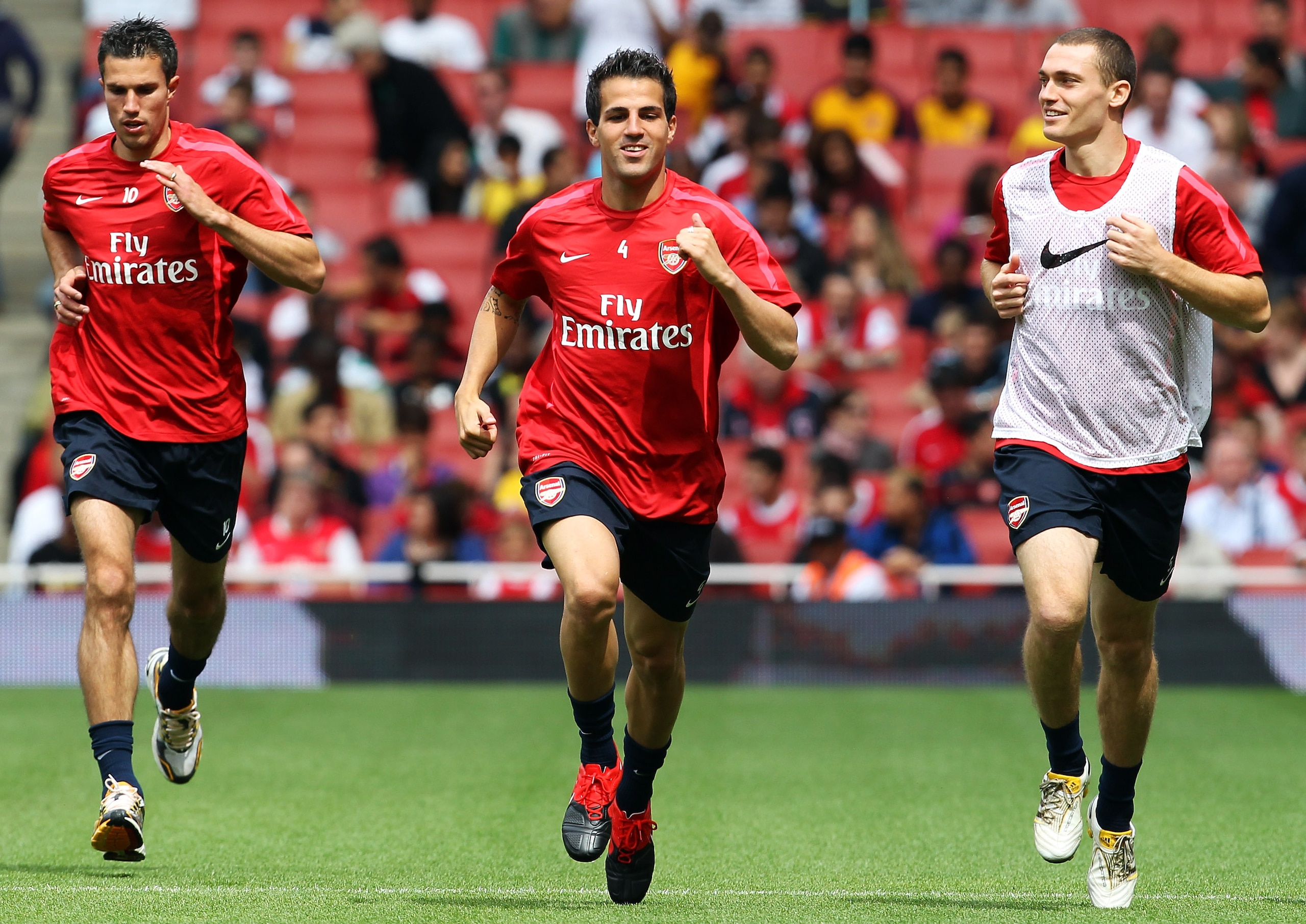 LONDON, ENGLAND - AUGUST 05:  (l to r) Robin Van Persie, Cesc Fabregas and Thomas Vermaelen attend an Arsenal open training session at Emirates Stadium on August 5, 2010 in London, England.  (Photo by Bryn Lennon/Getty Images)