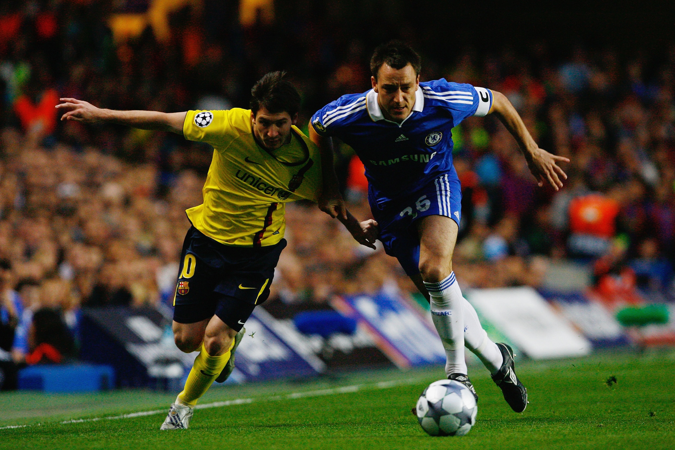 LONDON, ENGLAND - MAY 06:  John Terry of Chelsea battles for the ball with Lionel Messi of Barcelona  during the UEFA Champions League Semi Final Second Leg match between Chelsea and Barcelona at Stamford Bridge on May 6, 2009 in London, England.  (Photo