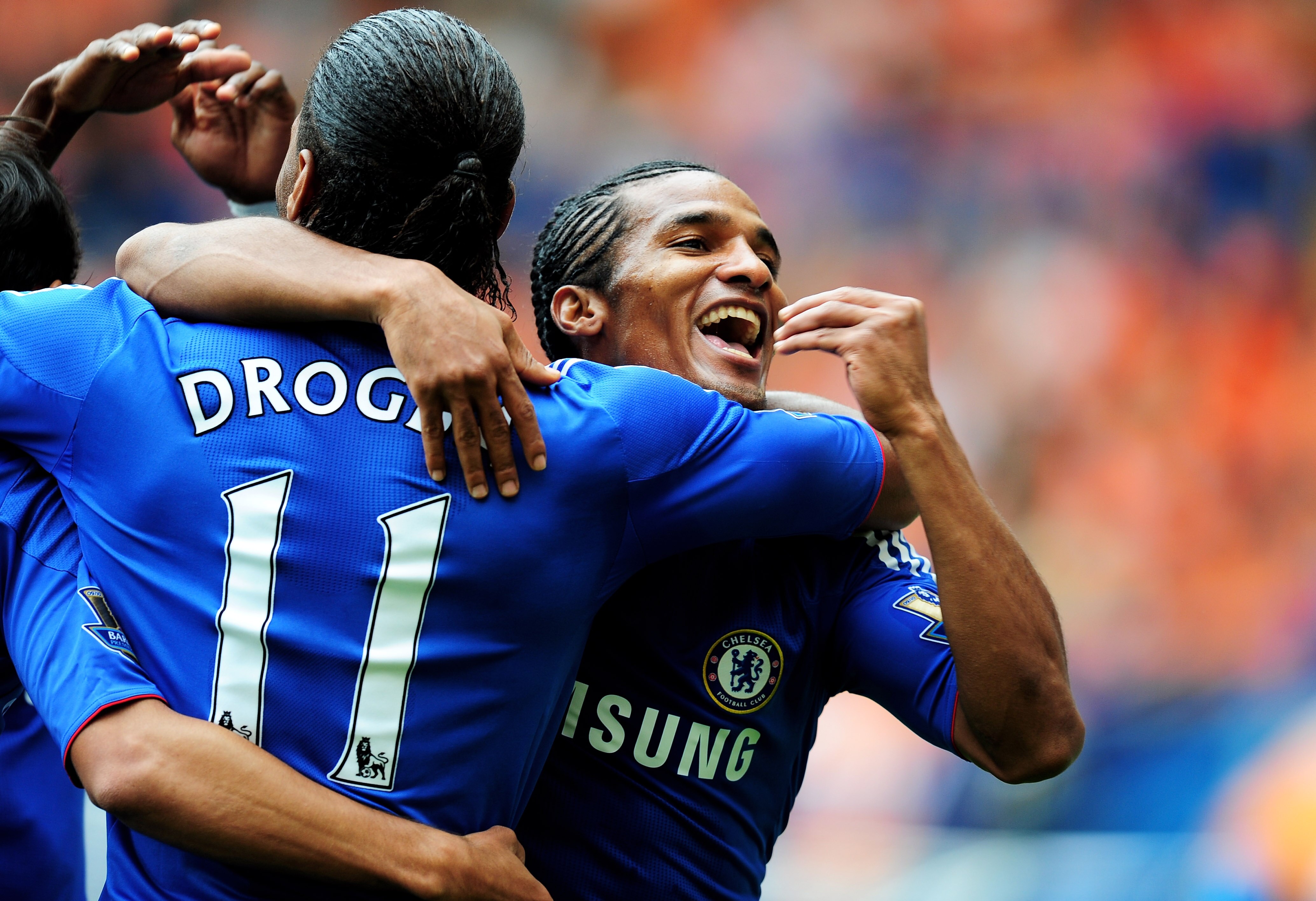 LONDON, ENGLAND - SEPTEMBER 19:  Florent Malouda (R) of Chelsea celebrates with teammates after scoring his team's second goal during the Barclays Premier League match between Chelsea and Blackpool at Stamford Bridge on September 19, 2010 in London, Engla