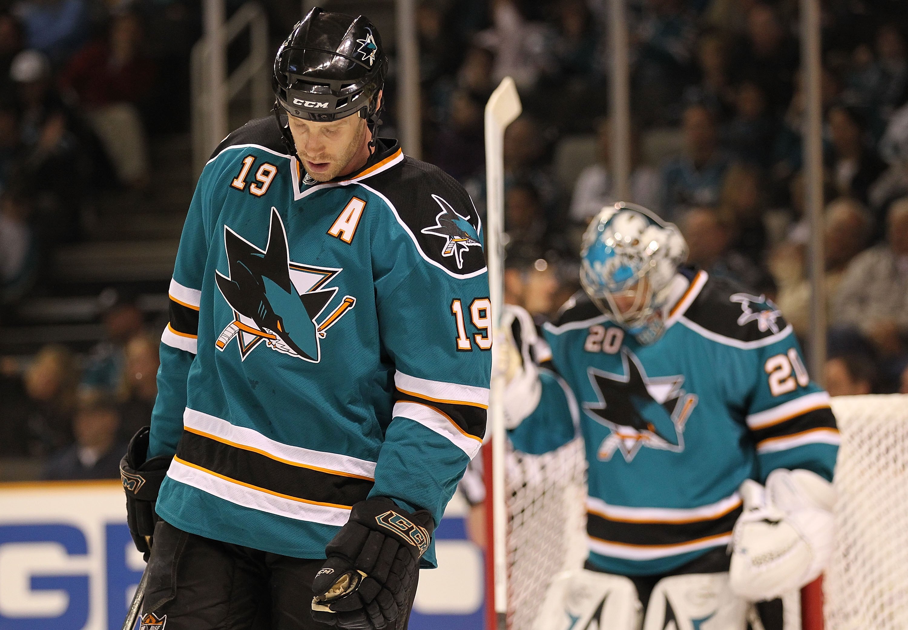 SAN JOSE, CA - APRIL 14:  Joe Thornton #19 and Evgeni Nabokov #20 of the San Jose Sharks looks on against the Colorado Avalanche in Game One of the Western Conference Quarterfinals during the 2010 NHL Stanley Cup Playoffs at HP Pavilion on April 14, 2010