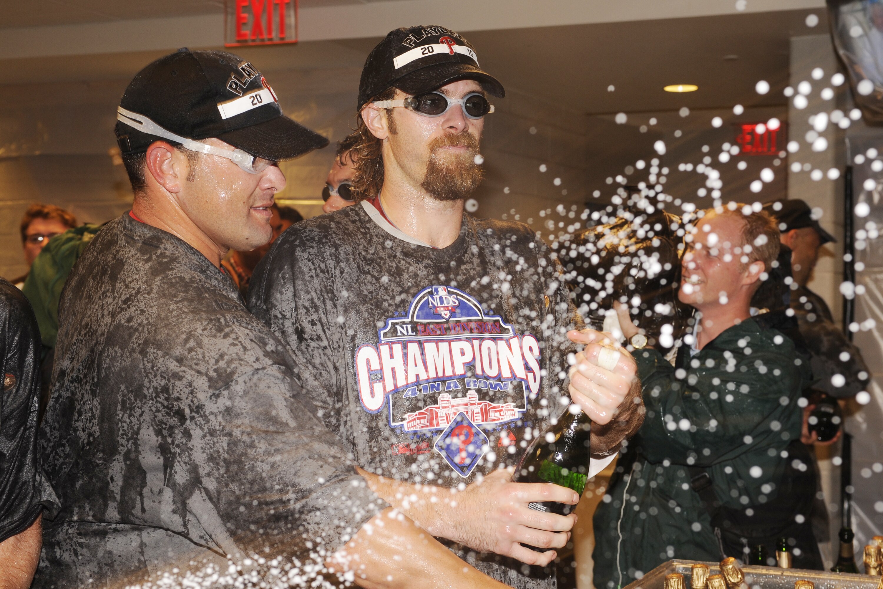 WASHINGTON - SEPTEMBER 27:  Danny Baez and Jayson Werth of the Philadelphia Phillies celebrate clinching the National League east title after a baseball game against the Washington Nationals on September 27, 2010 at Nationals Park in Washington, D.C.  The