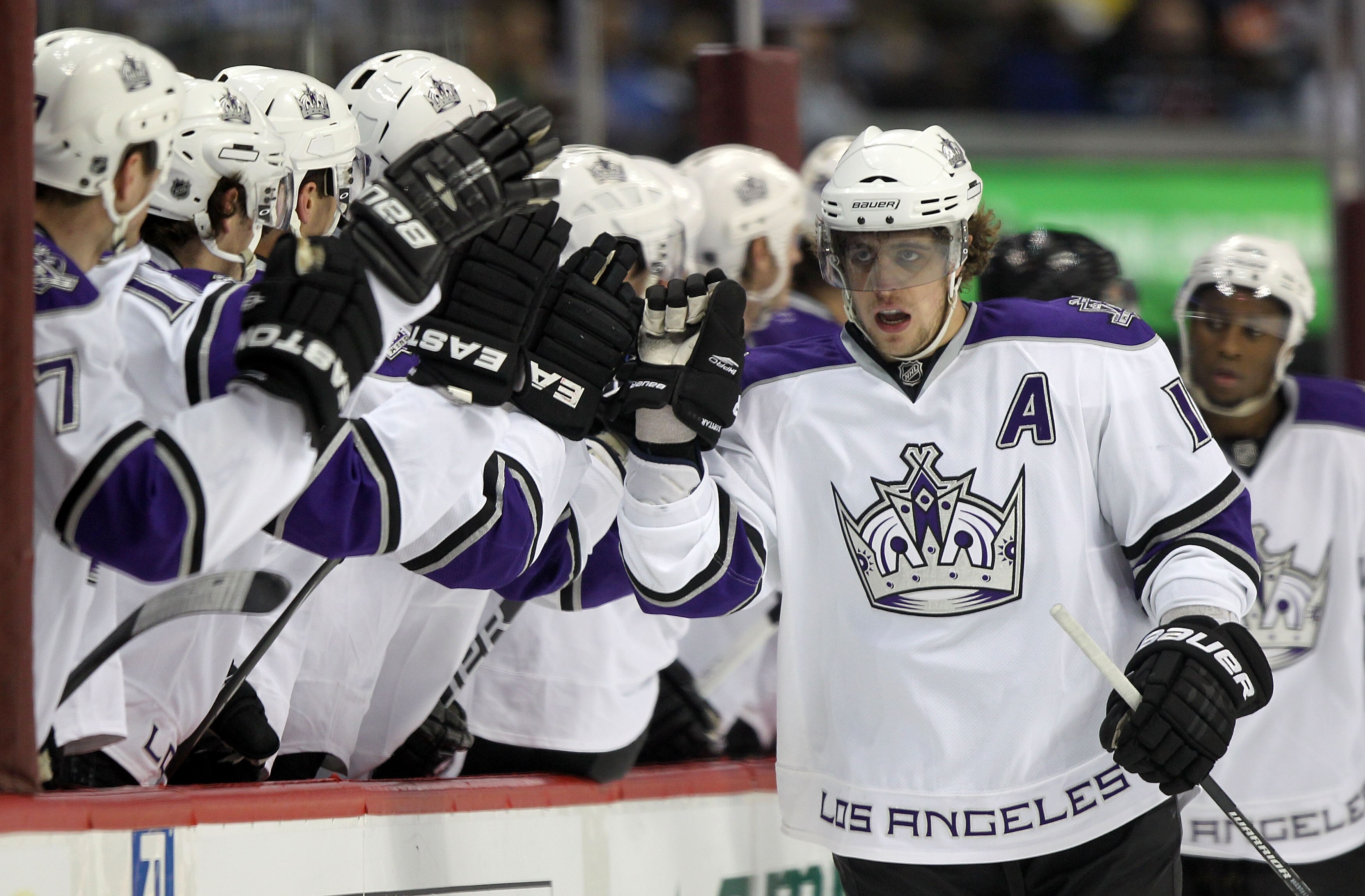 DENVER - MARCH 24:  Anze Kopitar #11 of the Los Angeles Kings is congratulated by his bench for his first period goal against the Colorado Avalanche during NHL action at the Pepsi Center on March 24, 2010 in Denver, Colorado.  (Photo by Doug Pensinger/Get