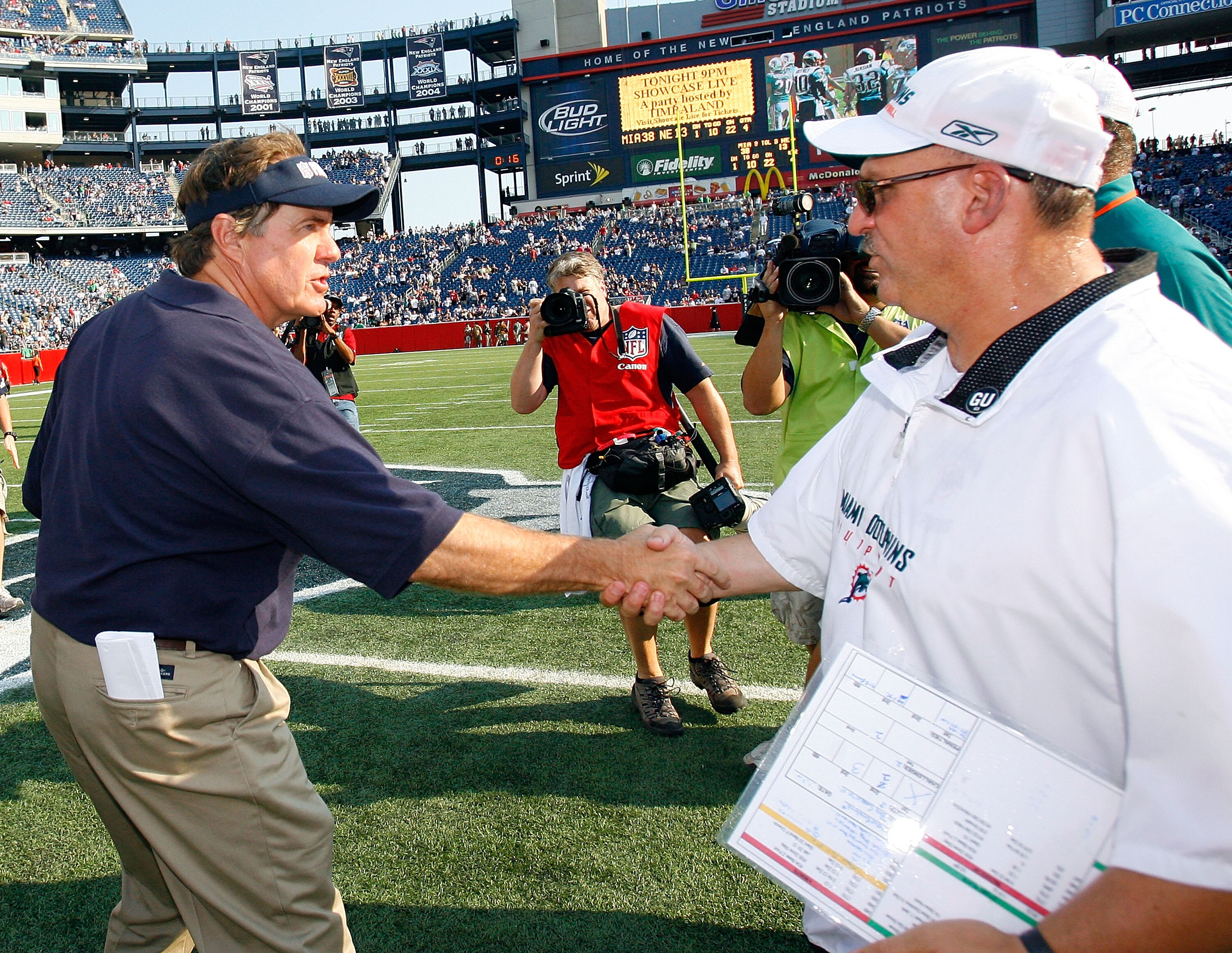 FOXBORO, MA - SEPTEMBER 21: Coach Bill Belichick of the New england Patriots shakes hands with coach Tony Sparano of the Miami Dolphins after a 38-13 Dolphin win at Gillette Stadium on September 21, 2008 in Foxboro, Massachusetts. (Photo by Jim Rogash/Get