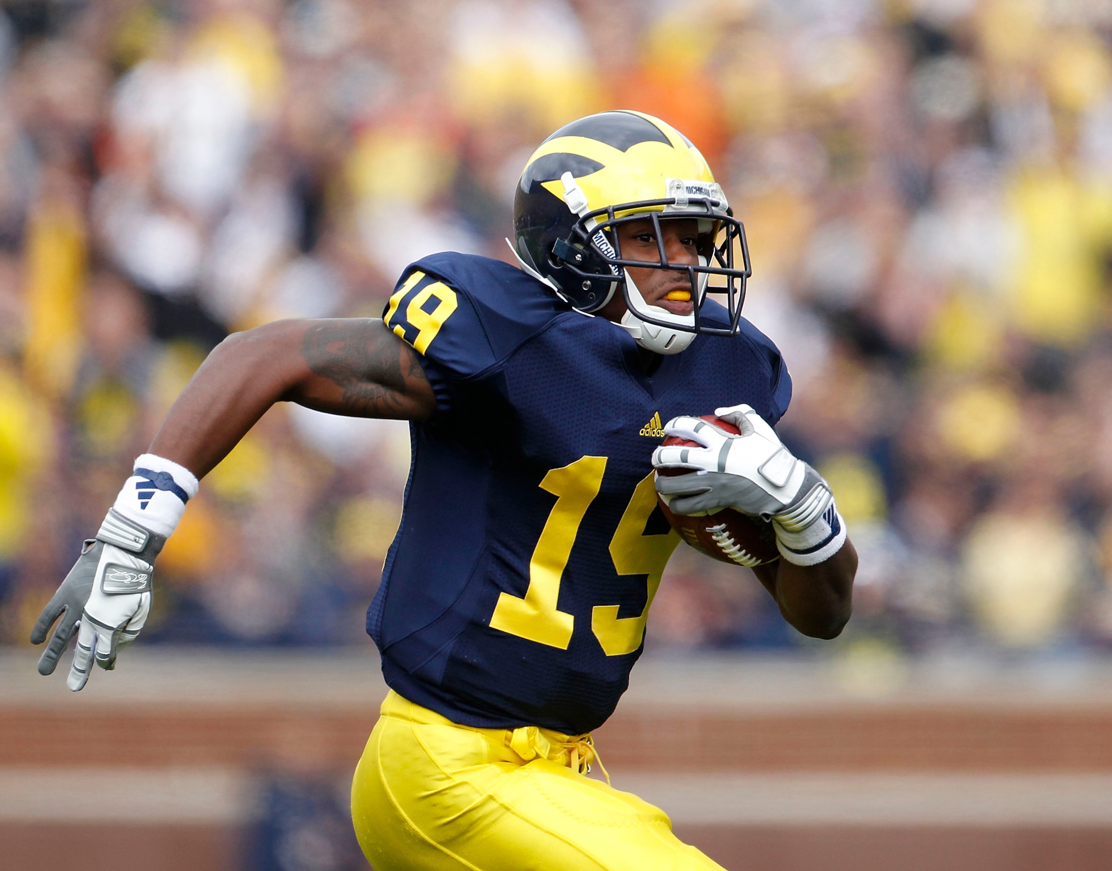 ANN ARBOR, MI - SEPTEMBER 25: Kelvin Grady #19 of the Michigan Wolverines runs for a 19 yard gain during the second quarter of the game against Bowling Green on September 25, 2010 at Michigan Stadium in Ann Arbor, Michigan. Michigan defeated Bowling Green